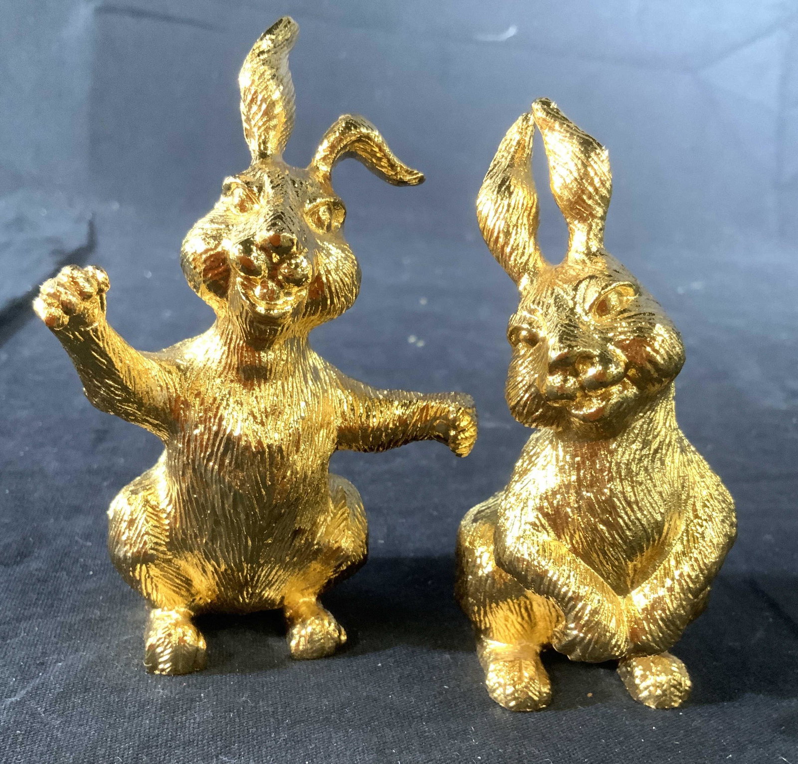 Pair Signed Gold Plated Rabbit Figurals: Each signed illegibly on underside, each has weight solid, Gold plated pair of whimsical standing rabbit figurals, decorative arts, tableware, each measures ht app 4.5 inches, each with different faci