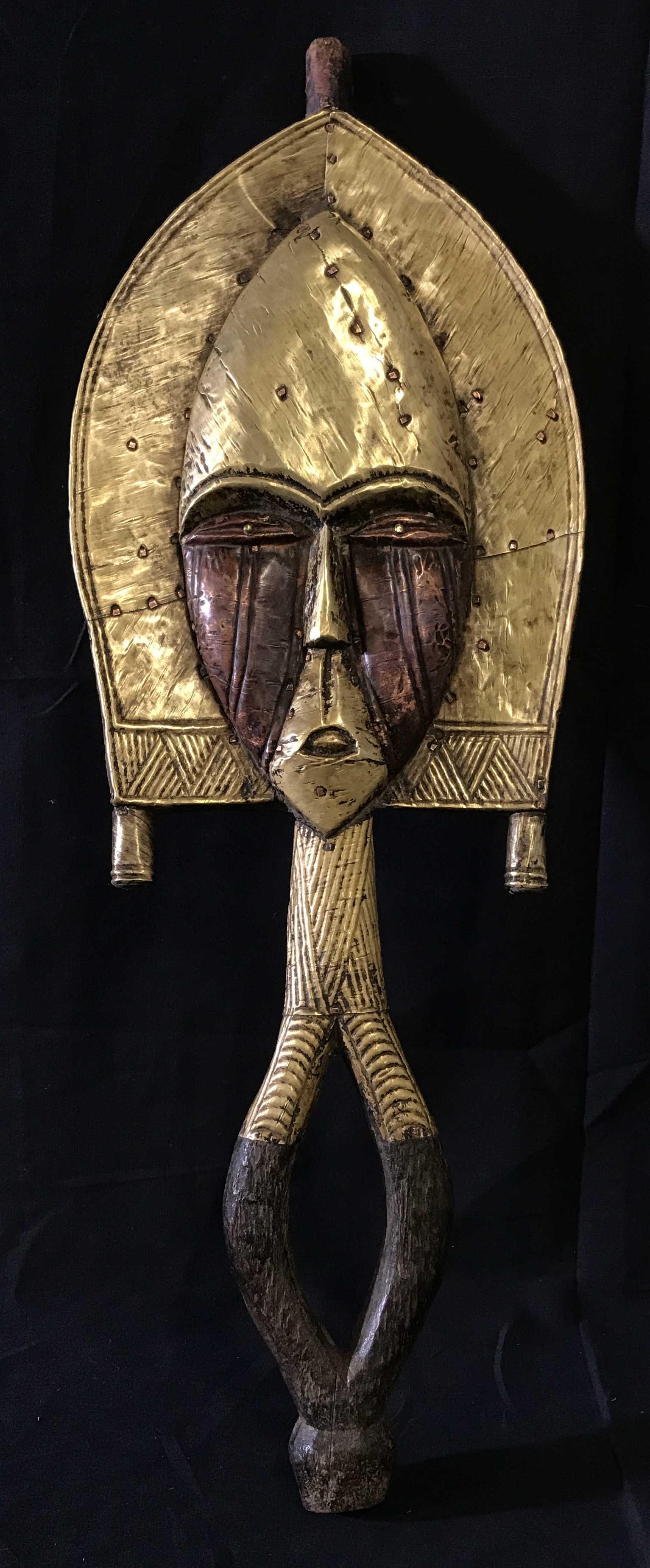 Bakota Obamba Statuary: Bakota obamba statuary from Gabon Central Africa, traditionally used for ancestral worship, wooden totem with copper plating possibly gold leaf on copper plating, a part of the Collection of Sam Hilu 