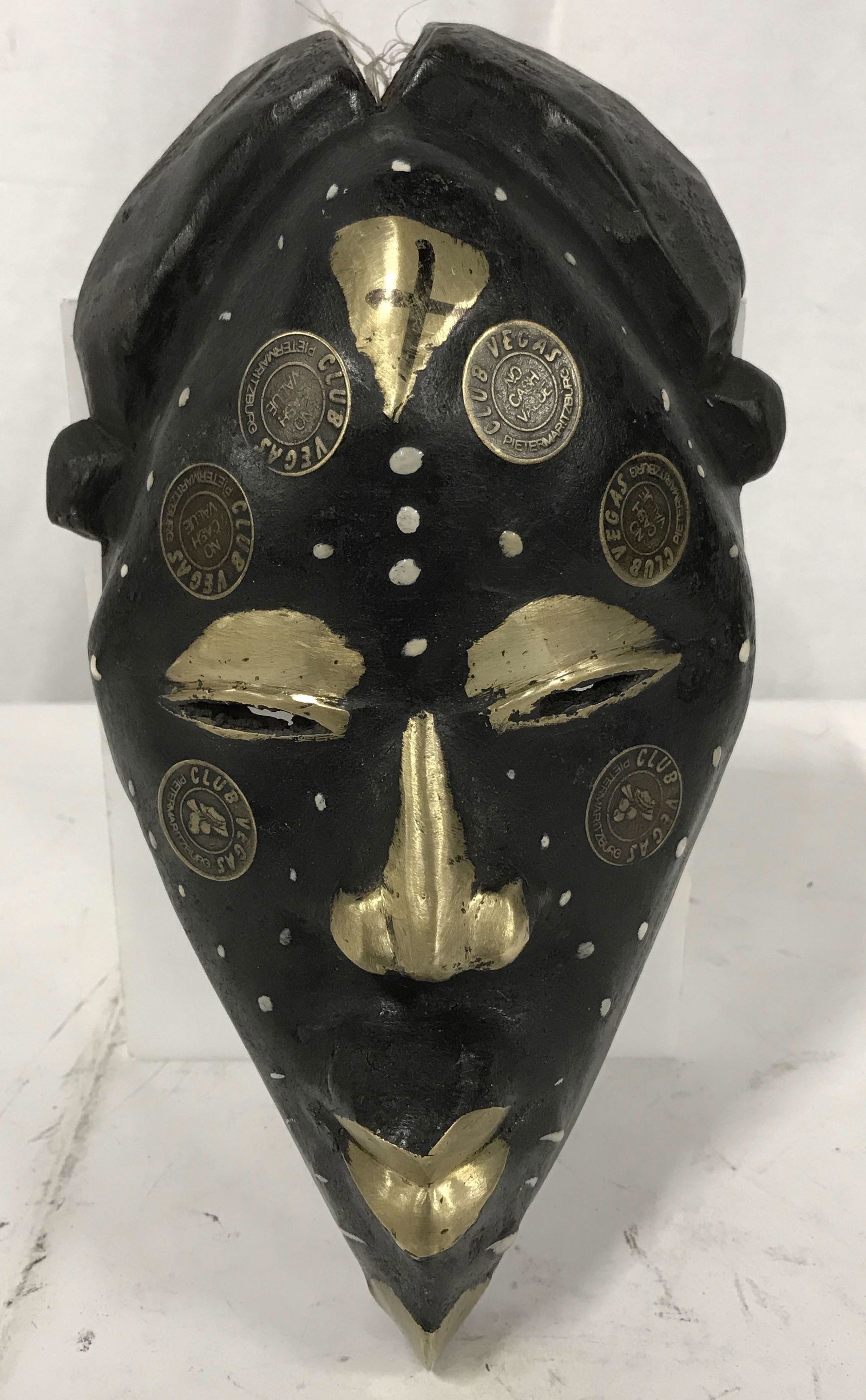 Nigerian Money Mask: Nigerian money mask, mask passport cross river Cameroon, decorated with bronze and old Nigerian coins called Koboh, colored black white and bronze, plastics string looped through hole carved on the to