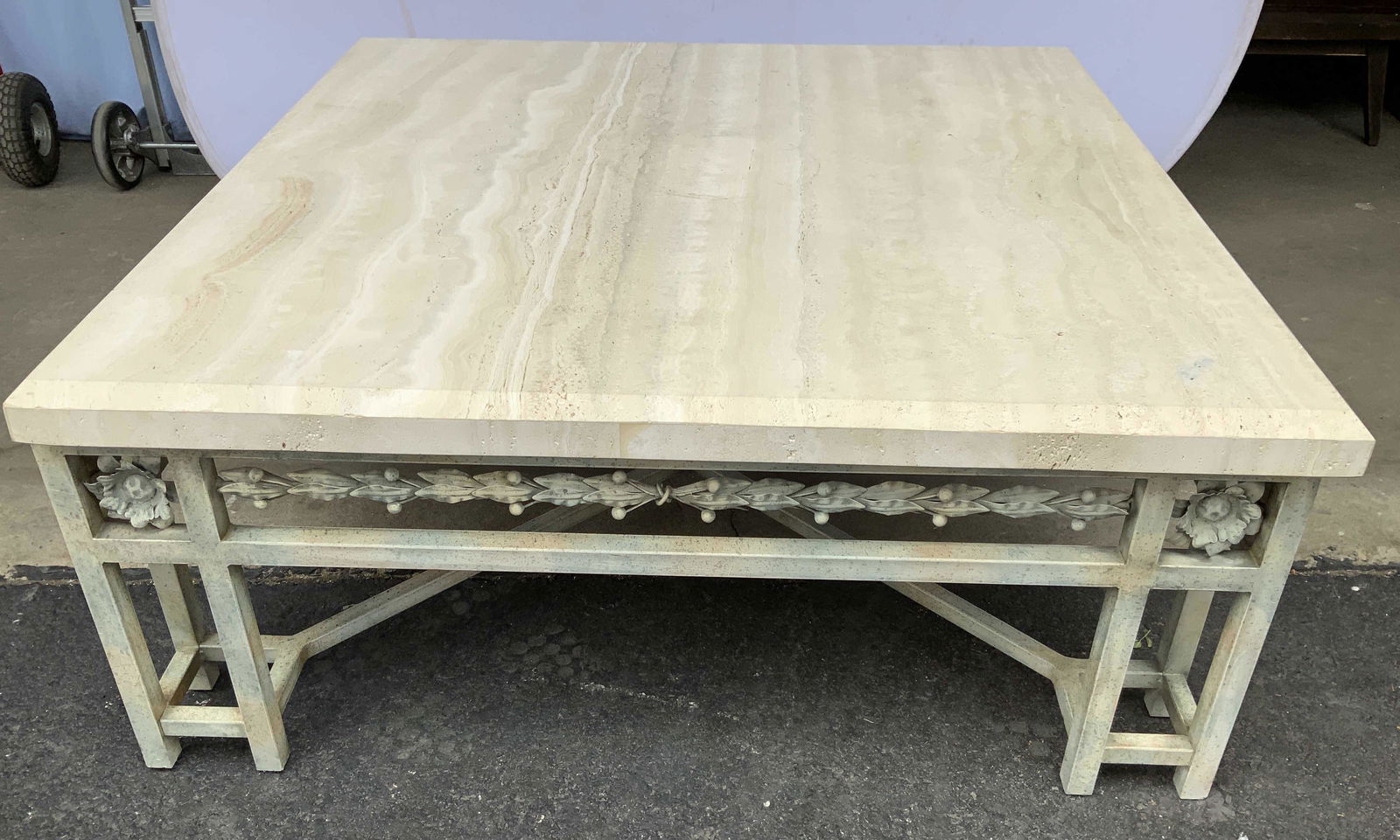 Painted metal and Stone topped coffee table: Measures 4 feet square , ht app 19 inches, painted metal base with floral vine and leaf open work apron, open sided legs at each corner with floral medallions, beveled thick stone top, coffee table, l