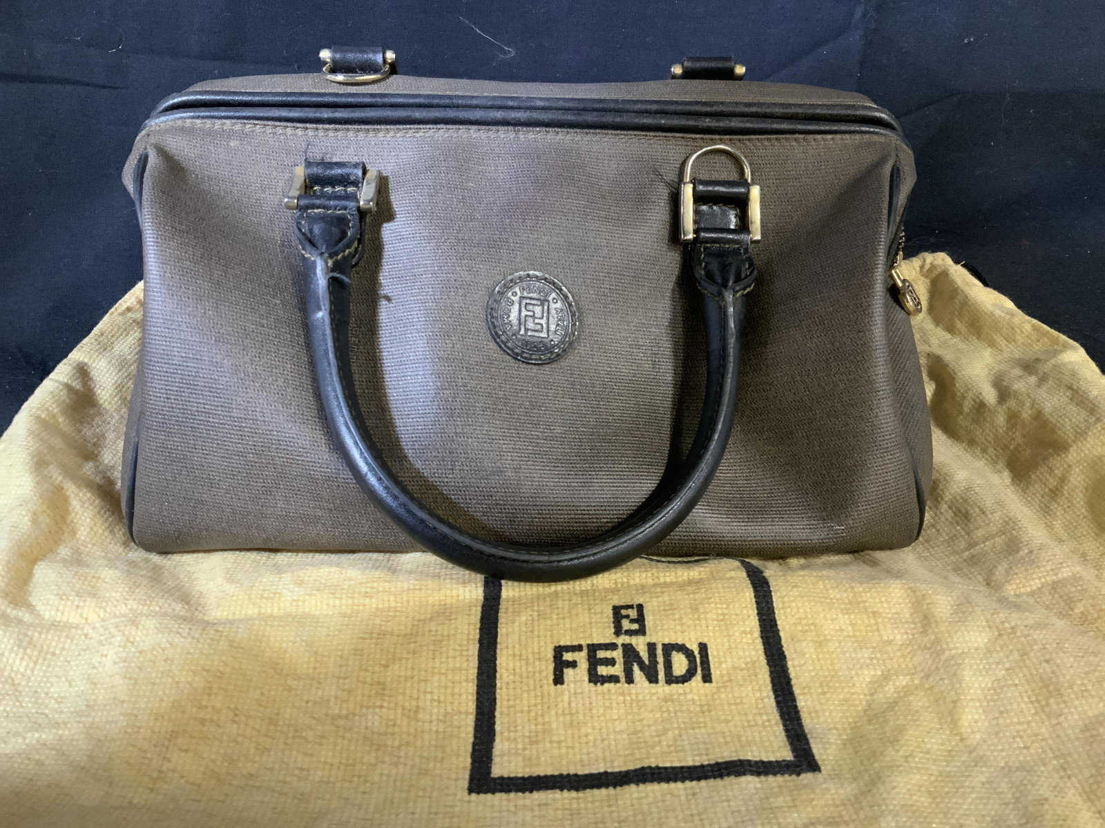 Vintage Fendi Designer Pocket Book w Dust Bag: Made in Italy, Comes with Fendi Dust cover carry bag, purse is two tone leather, Fendi emblem and iconic logo on bag, purse, handbag, pocket book, measures ht app 6.5 inches to handle base, length 13 