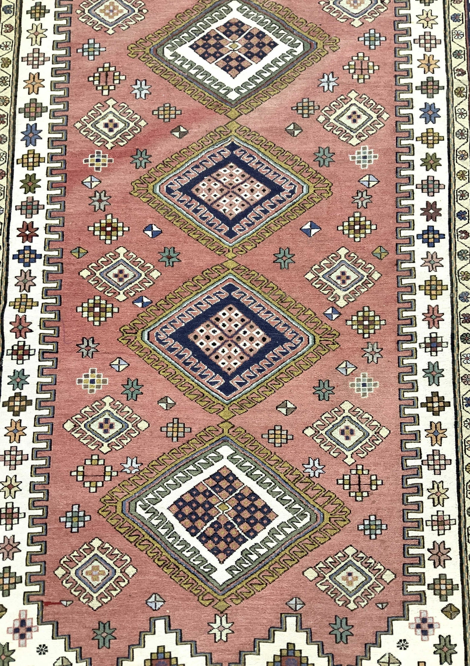 Hand Made Wool Oriental Carpet: In tones of pink, creams and turquoise, oriental carpet, rug, wool rug, mixed materials rugs flat weave rug, decorative arts, textile arts, home decor, home furnishings, measures 79 by 47 inches