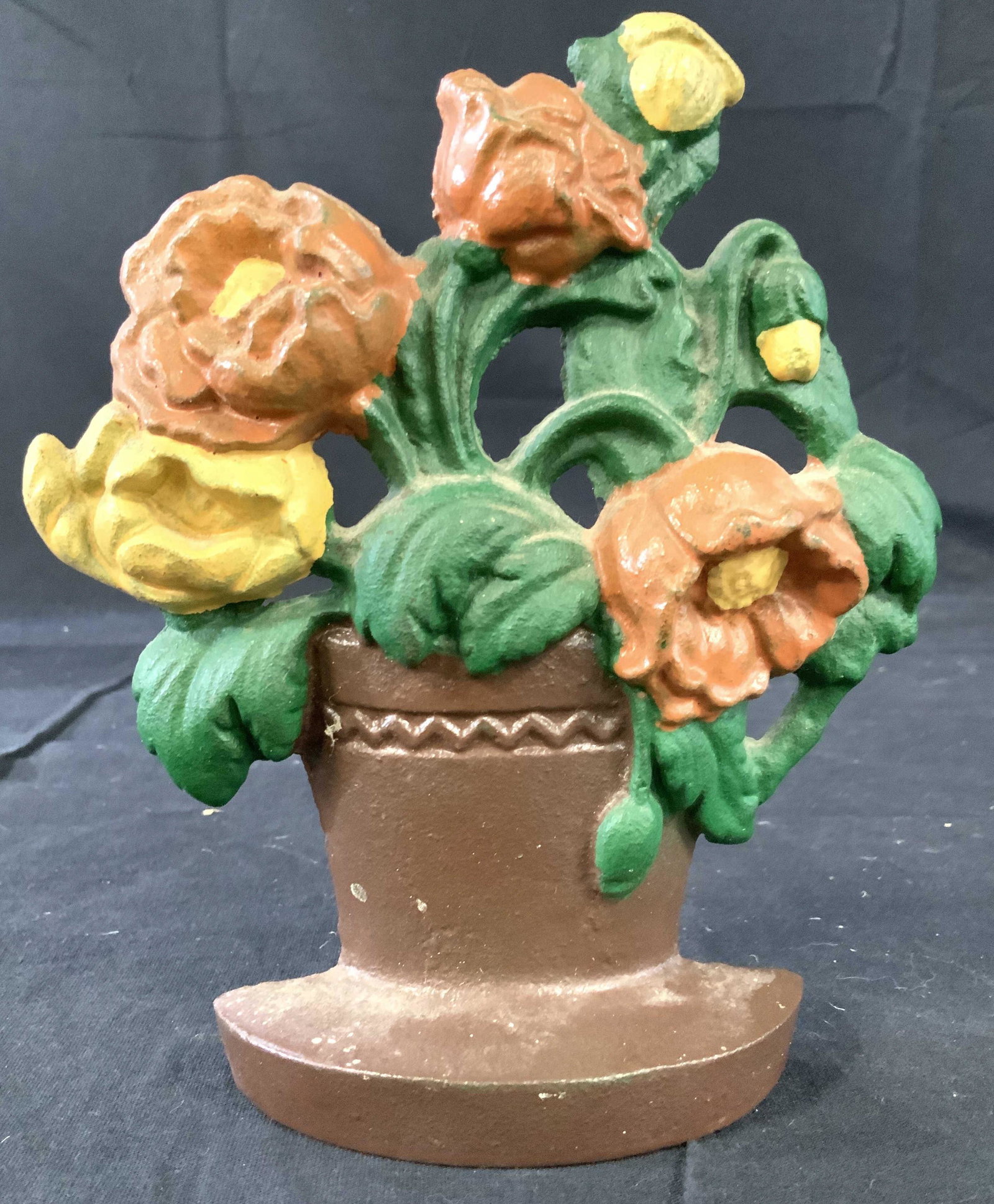 Signed Painted Cast Iron Door Stop: Signed on back with initials C N, Flowers in a basket, vintage possibly antique iron door stop, decorative accessory, decorative arts, door stop collectible, measures ht app 7 inches width 4.5 inches