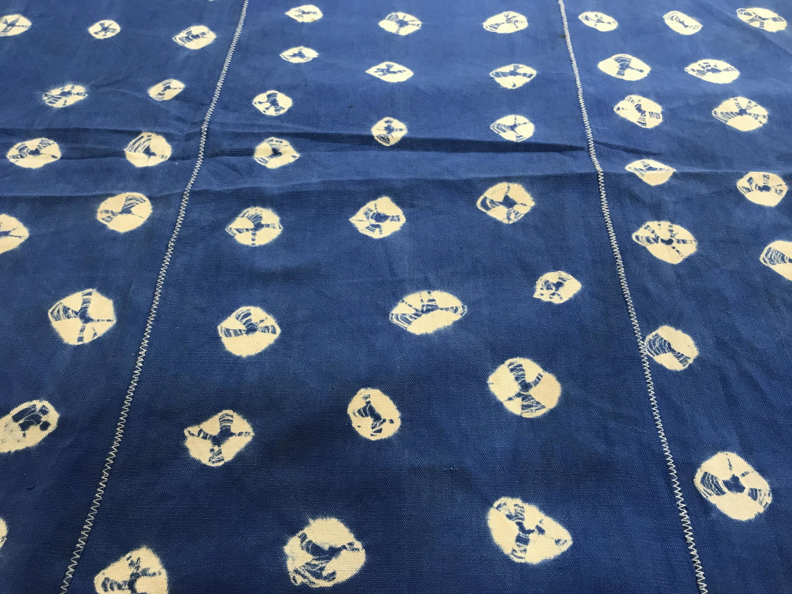Vintage Burkina Faso Indigo Textile: Vintage Burkina Faso Indigo textile with Shell pattern, fabric with threads loose on the ends, originates from Burkina Faso West Africa officially the Republic of Burkina Faso, overall in good conditi