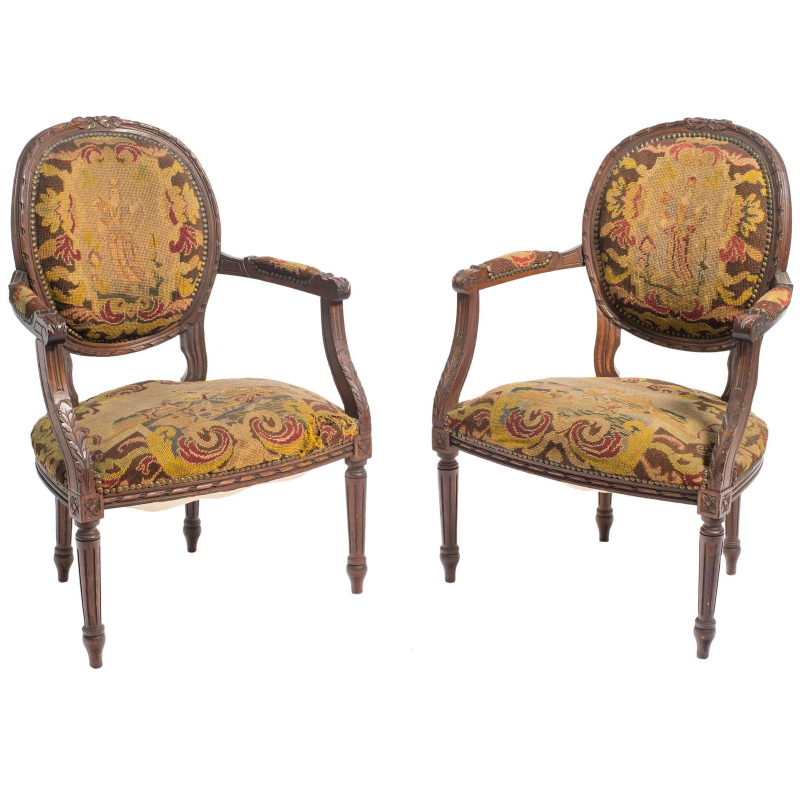 Pair Antique French Needlepoint Armchairs: Pair antique French Bergères, arm chairs, needlepoint tapestry scene seats and backs, circa 1920 French antiques, French decorative arts, carved leaf forms on arms, scrolled arms, tapered receded leg