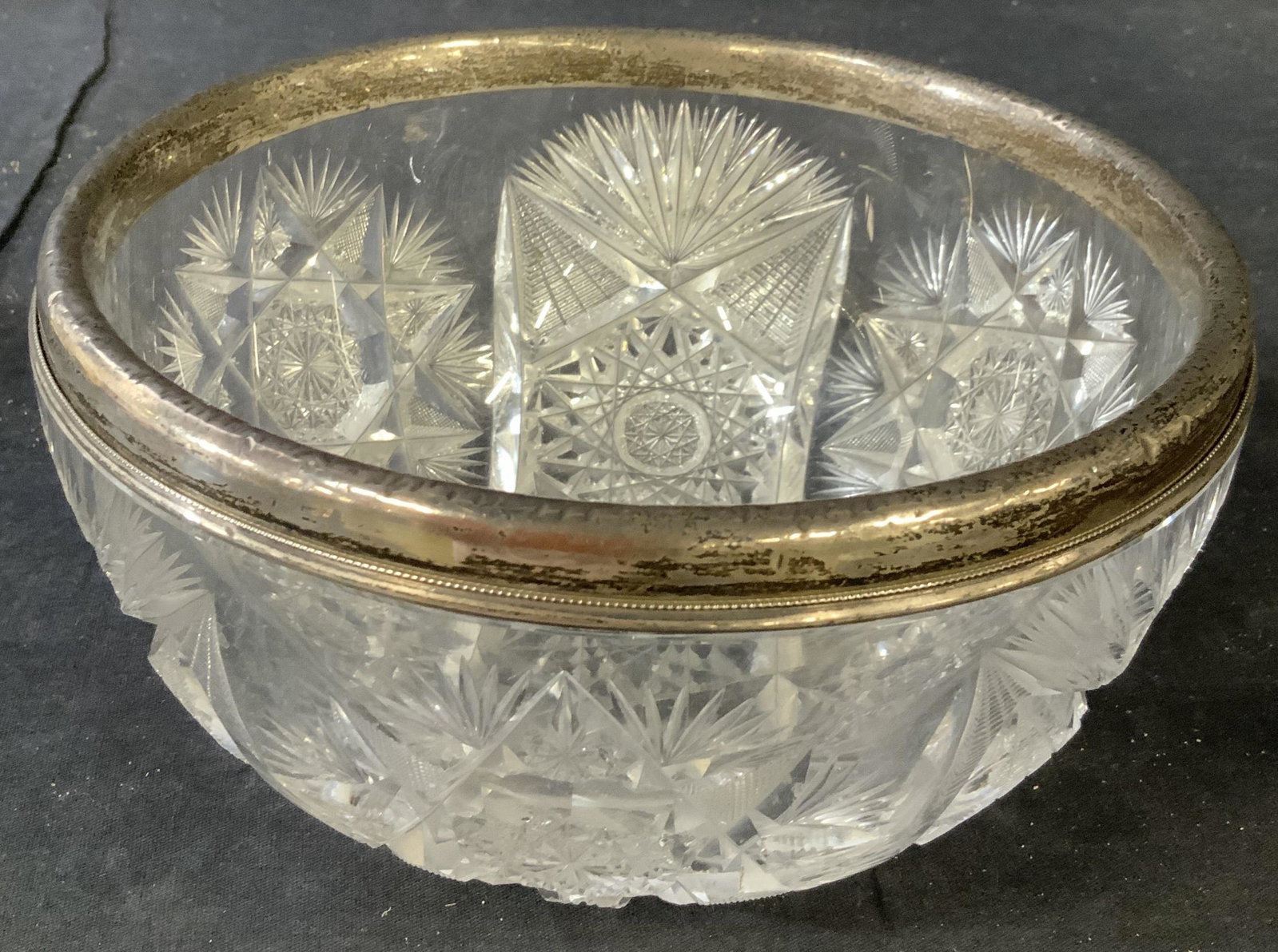 Sterling Silver Rimmed Cut Crystal Bowl: Marked for Sterling cut crystal centerpiece bowl, table ware, tabletop decor, decorative arts and accessories, measures ht 4.5 inches, diameter app 8.5 inches
