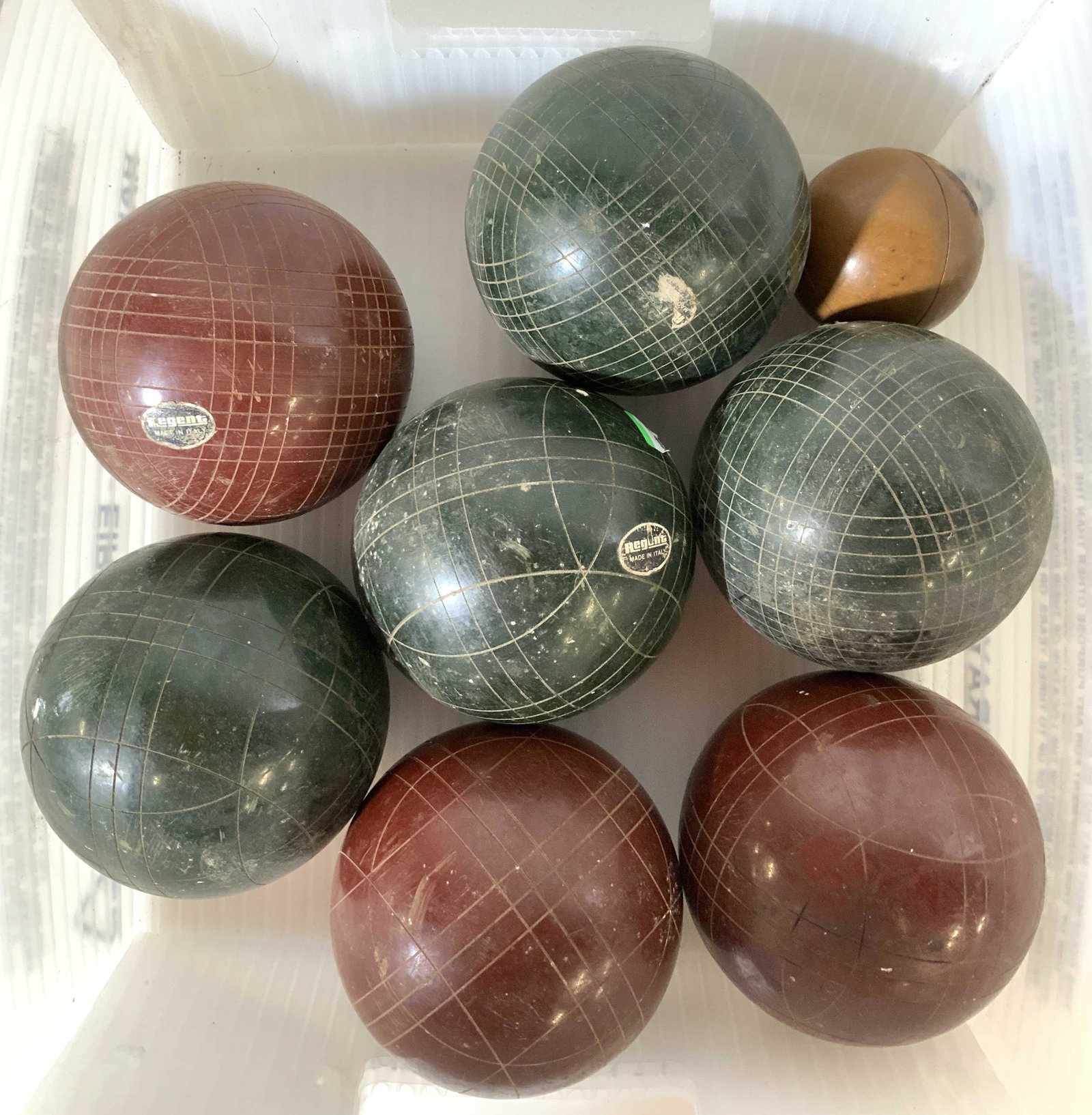 Set 8 Vintage REGENT Bocce Balls, Made in Italy: Italian Vintage possibly Antique Bocce Balls, label for REGENT, and made in Italy,Bocce, Bocce Balls, each has weight, colors of maroon green and gold toned, etched w partial lattice designs, most wit