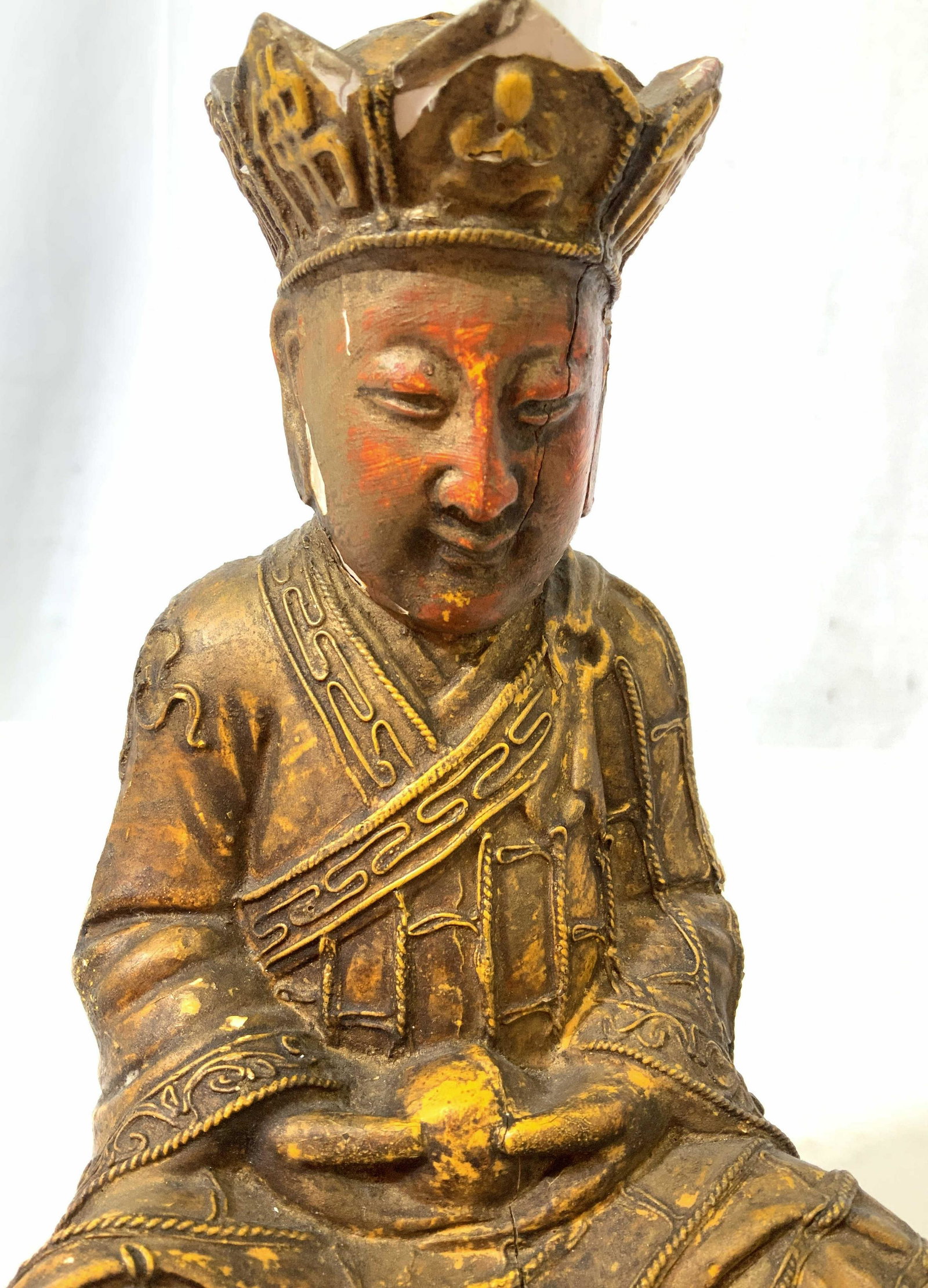 Antique Chinese Wood Carved Painted Buddha: Vintage possibly antique Asian carved Seated Figural with crown and Chinese Characters, wood has age, has some of original paint red and gold toned, paint has wear, wood has wear, Buddha figural, crow