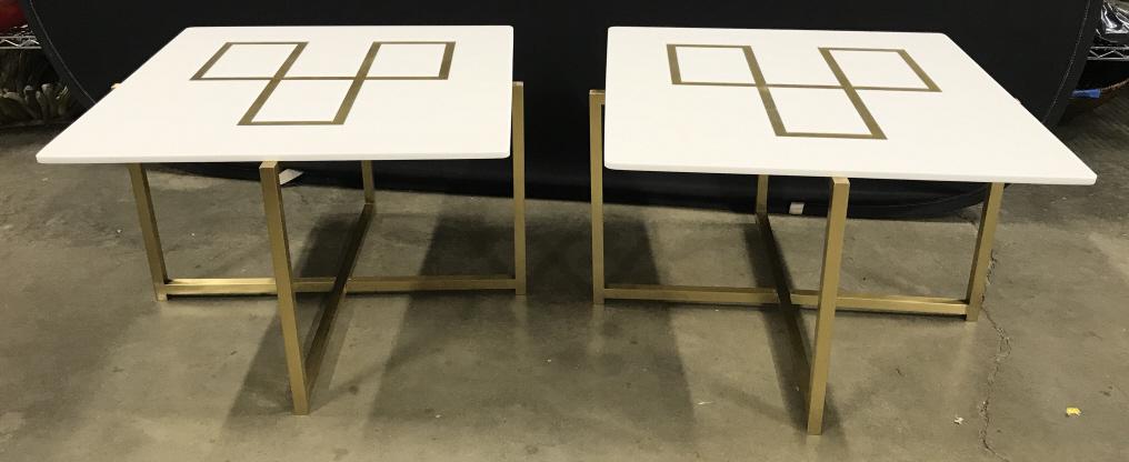 Pair Of Contemporary Side Tables att Harvey Prober: Pair Of Contemporary Side Tables, white glass tops with gold toned etched geometric shape design and gold toned metal bases, one chip to lower edge of glass top and minor surface scratches, measures a