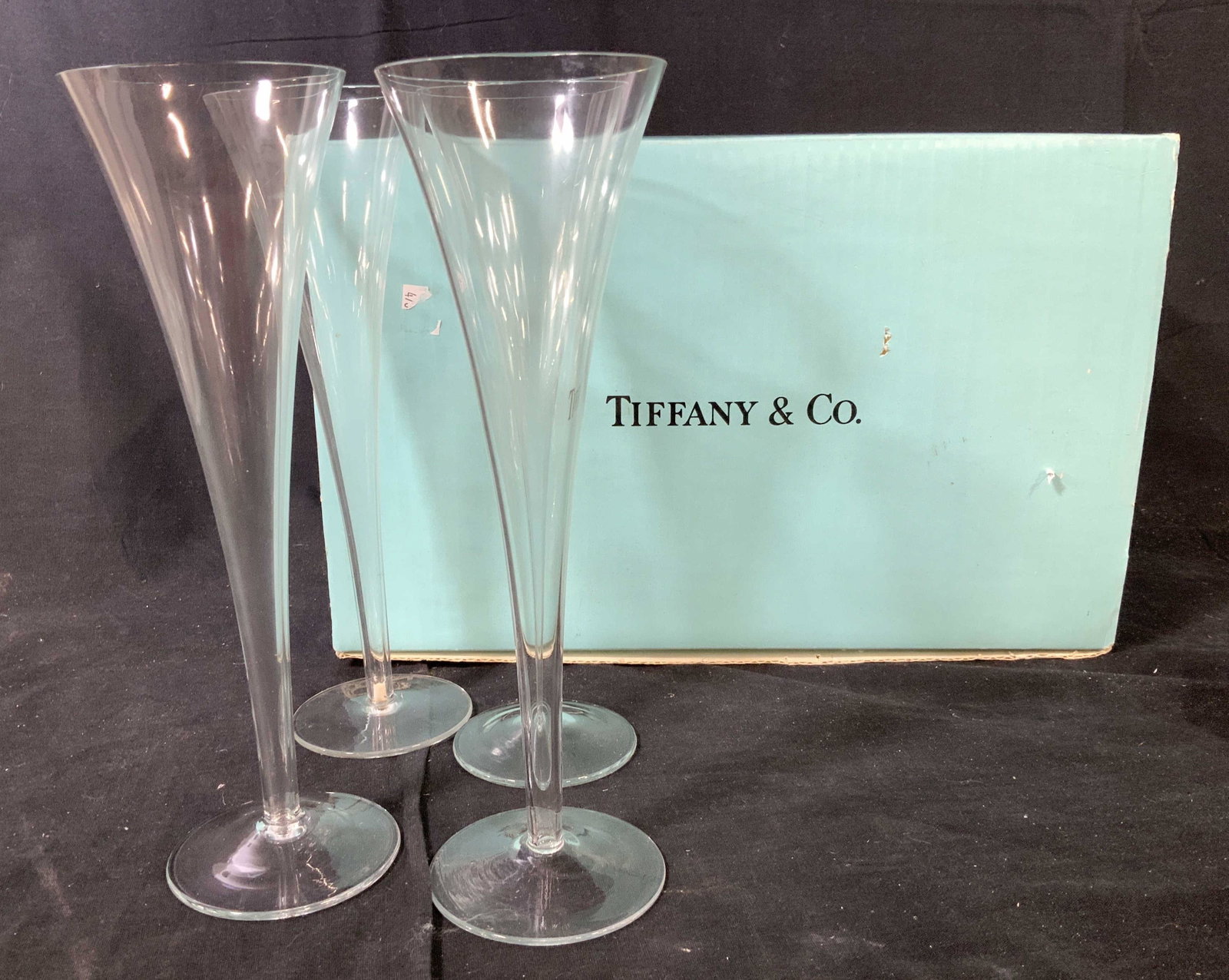 Set 4 Crystal Champagne Flutes in Tiffany Box: Crystal stemware, crystal champagne flutes, bar ware, found wrapped in Tiffany Box but no markings on crystal, set of 4 each measures ht 10 inches, bar ware, champagne stemware, celebratory drinks gla