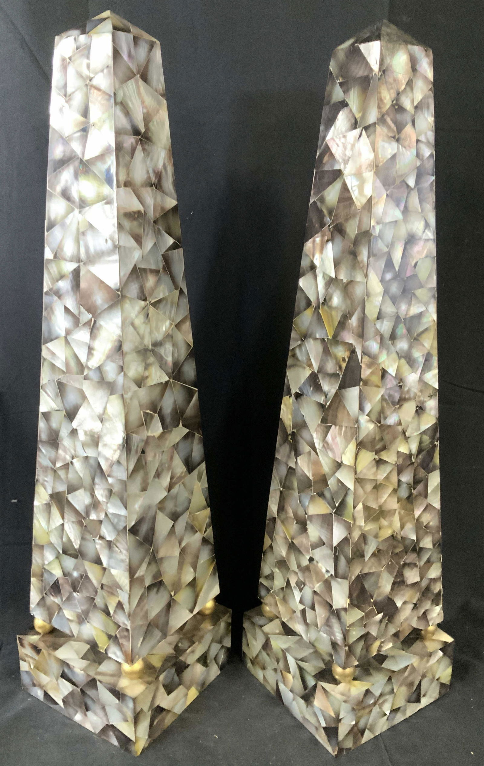 Pair Grand Mother of Pearl Mosaic Obelisks: Each measures ht app 30 inches, base app 7.5 inches square, mother of Pearl design with gilded ball feet in square bases, pair decorative accessories, decorative objects, decorative arts and crafts, o