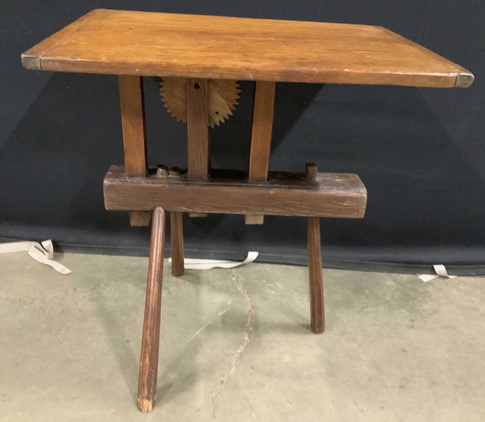 Antique Hand Crafted Side Table: American, folk art, arts and crafts, hand made table, with underside of three saw horse style splayed legs and spinning wheel, possibly cobblers beach, mechanical apparatus into table, country antique