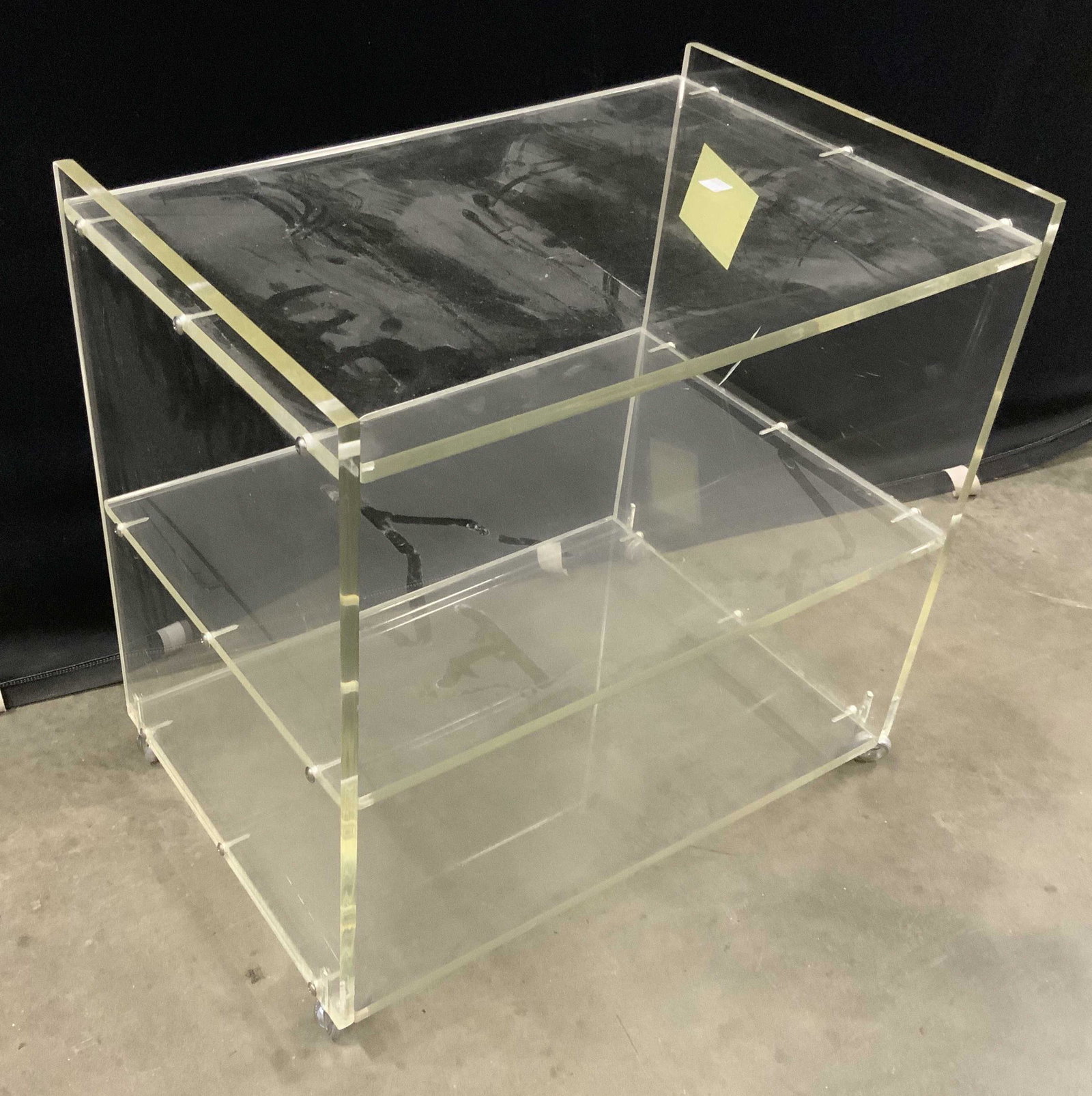 Vintage Lucite Cart Trolley on Wheels: Three shelved vintage Lucite cart, trolley, bar cart, drinks cart, side table, needs tightening, measures ht 21 inches top 23 by 15 inches