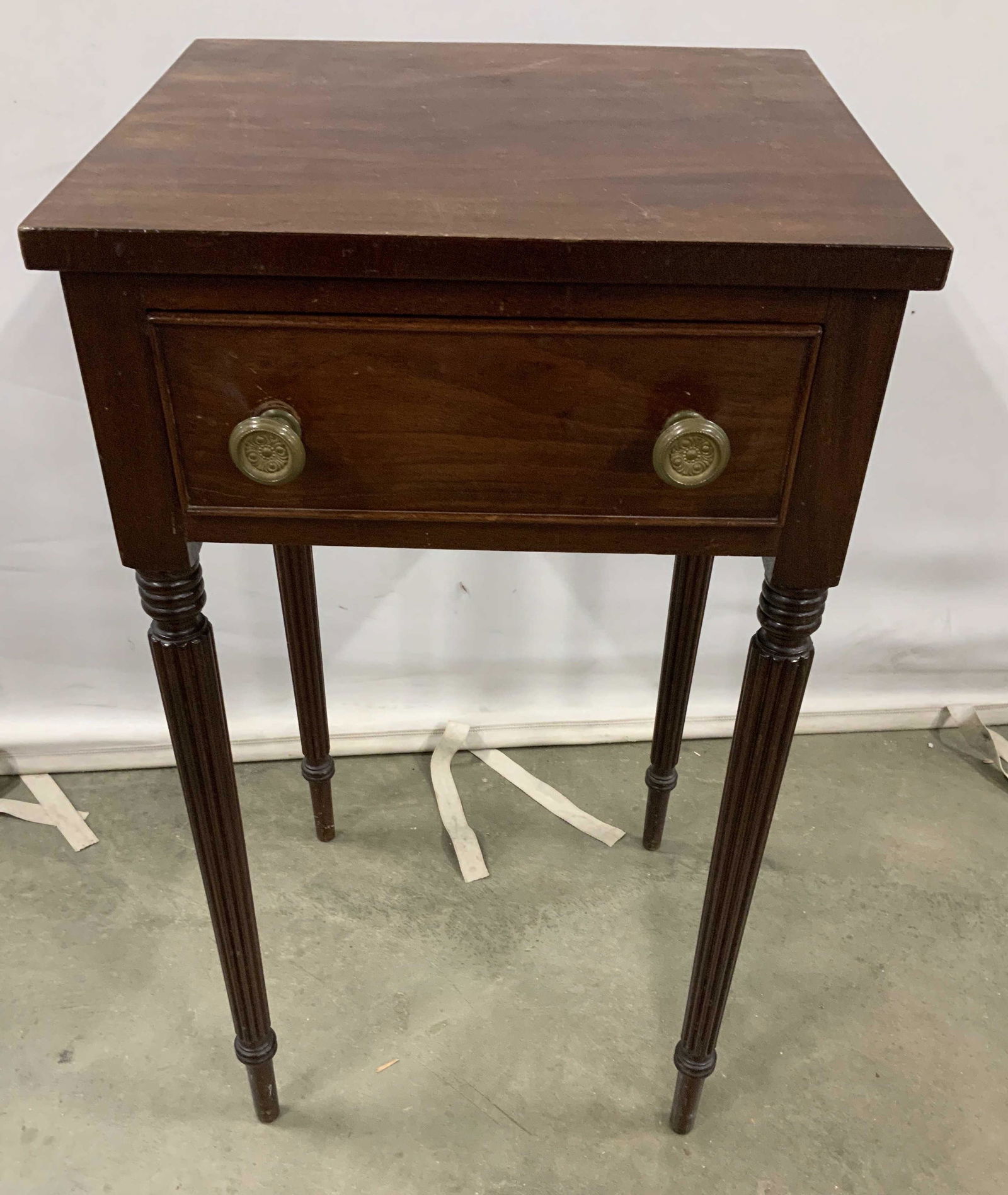 Antique Sheraton Style Mahogany Side Table: Tapered turned legs, single drawer with brass knobs, Sheraton style, circa early 1900’s, antique side table, end table, tea table, night table, measures ht 30 inches, 16 by 14.5 inches,