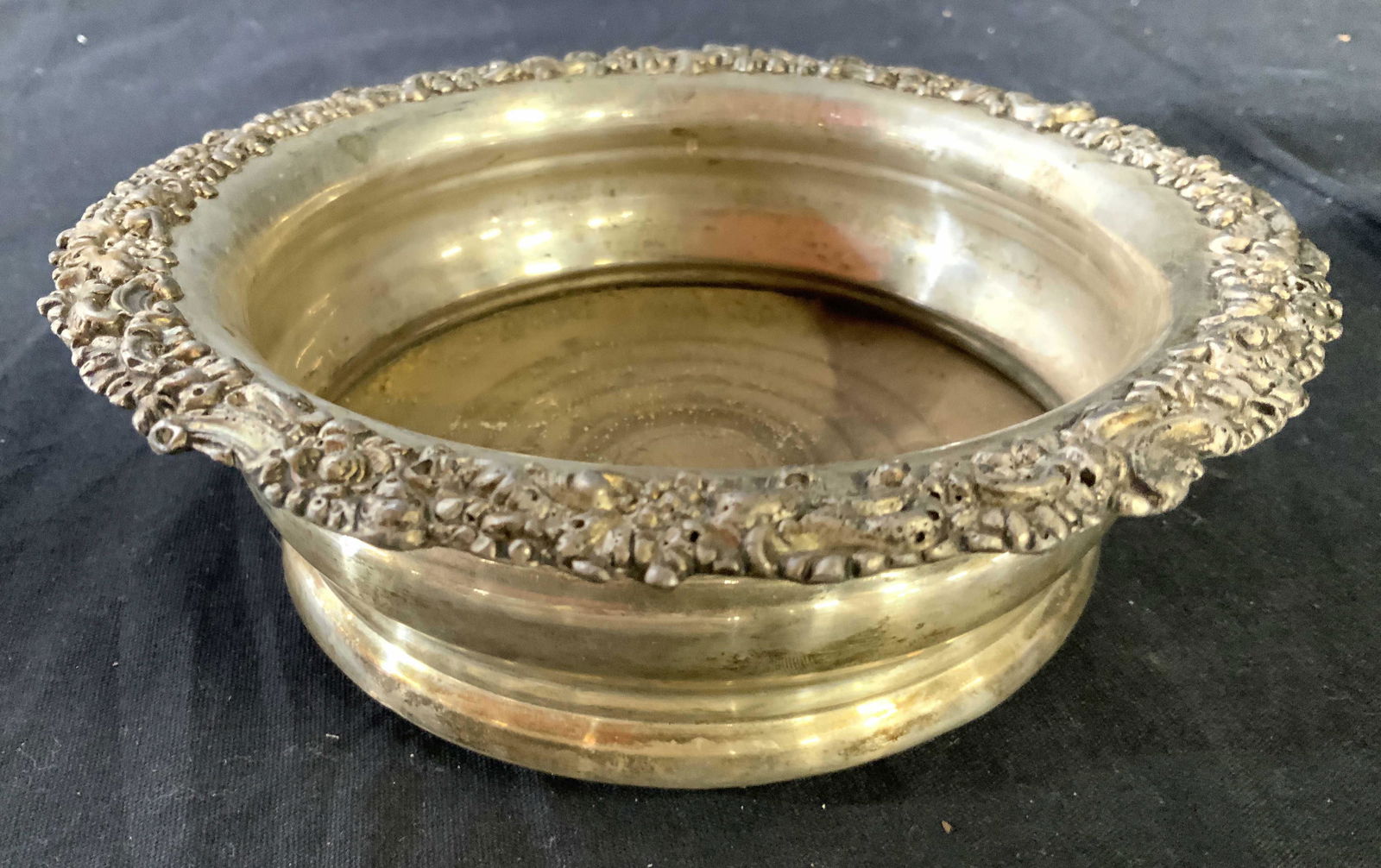 Antique Wood Silver Plate Repousse Wine Coaster: Possibly english silver coaster, caddy with art nouveau swirls and scrolls, ribbed side, wood center, bottle coaster, antique table ware, decorative arts measures htb2.5 inches diameter app 6.75 inche