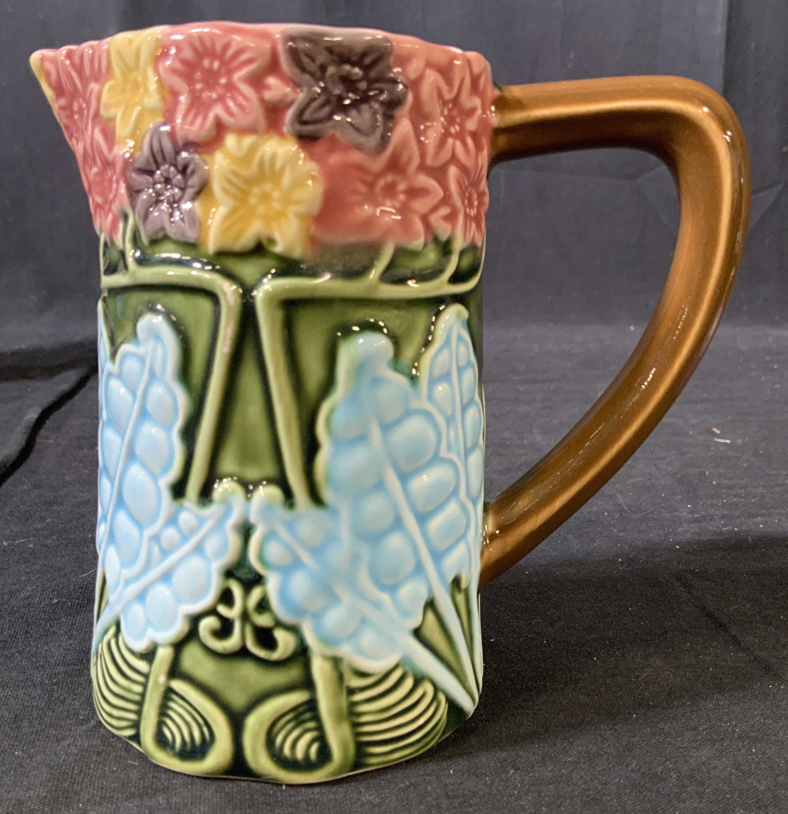 Majolica Style Ceramic Glazed Pitcher: Colorful ceramic in the style of majolica, label underside illegible, partially torn, measures app 5 inches ht, tableware, pitcher, decorative arts and accessories, drinks pitcher, water pitcher