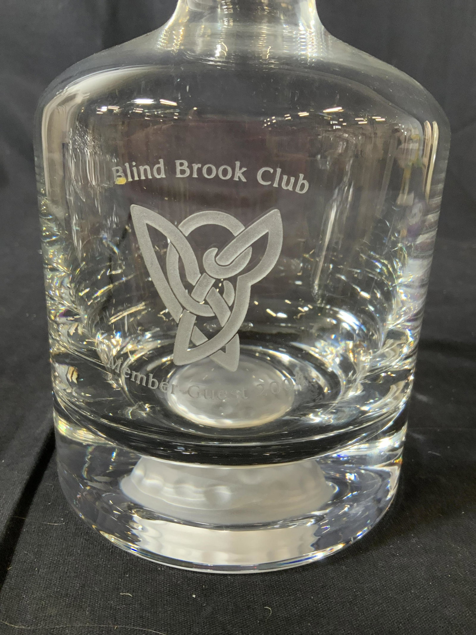 Etched personalized Crystal Decanter: Crystal decanter with frosted Golf Ball Design and etched Blind Brook Club logo, measures 10.5 inches, bar ware, tableware