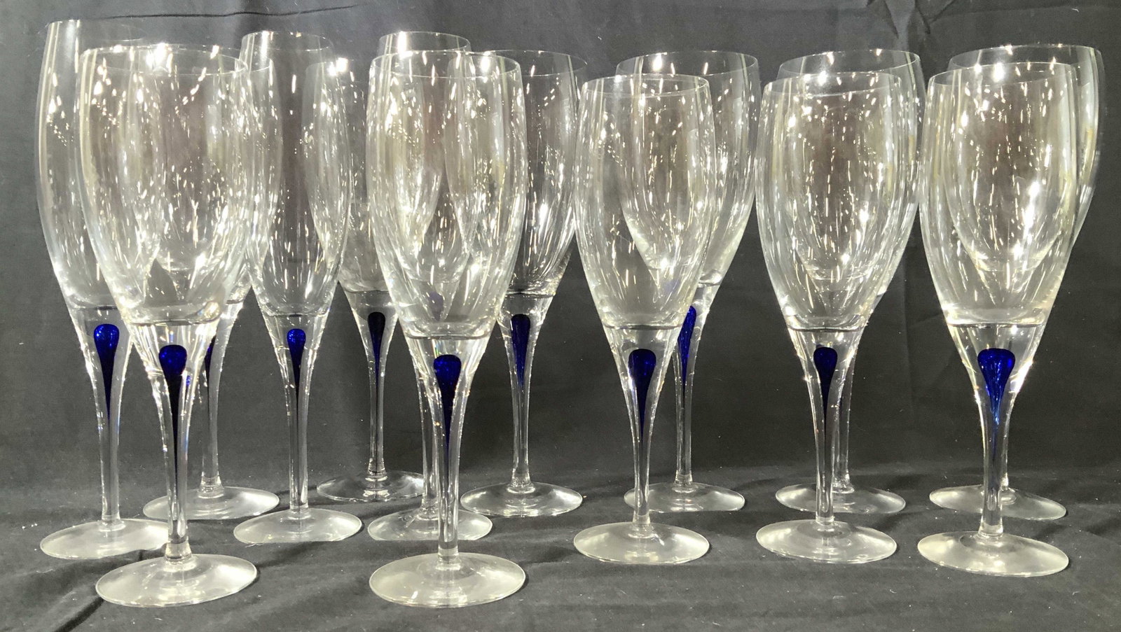 Partial ORREFORS Crystal Stemware Set Blue Drop: Swedish crystal, Orrefors stemware with blue tear drop design, Crystal table ware, stemware. Blue tear drop design includes 6 water glasses ht 10 inches, 5 wine glasses and 3 champagne flutes, total 1