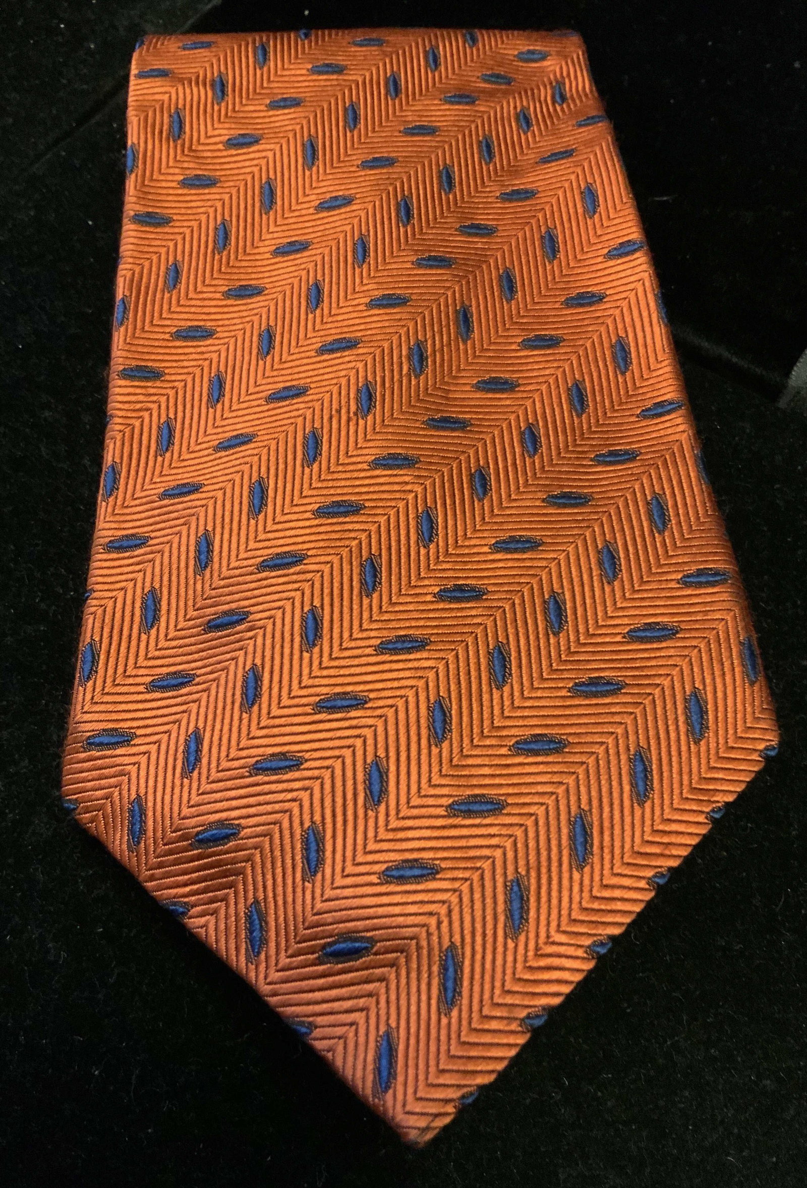 Frank Stella Ltd Designer Silk Tie, New York: Burnt orange color textured silk neck tie, designer fashion accessory, frank Stella, New York, wearable, label for all silk hand made in USA,