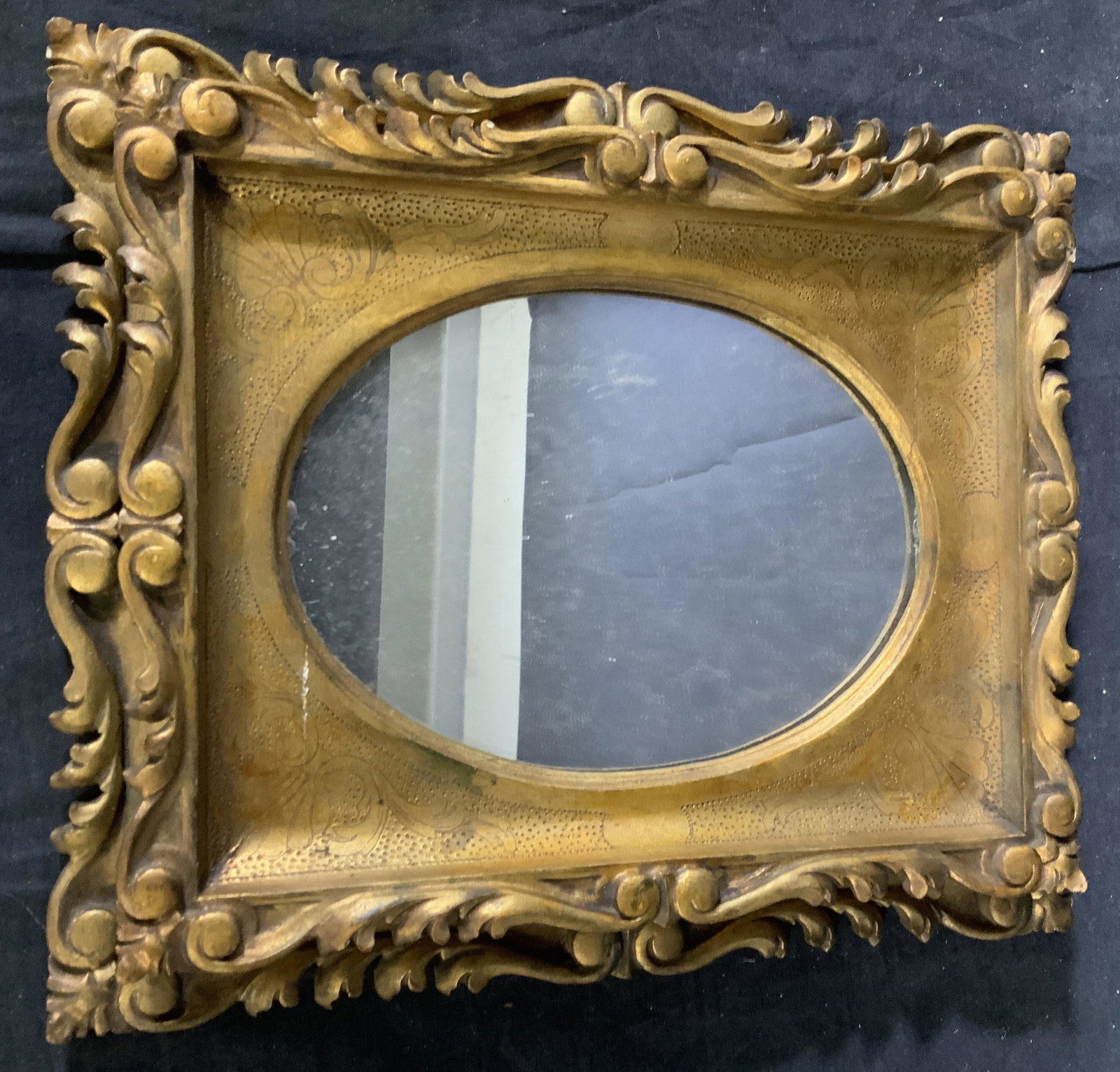 Antique Carved Gold Leafed Mirror: Carved frame, scroll work and etchings, antique frame, home accent, home furnishings, decor, measures app 2.5 inches depth , 12 by 15 inches