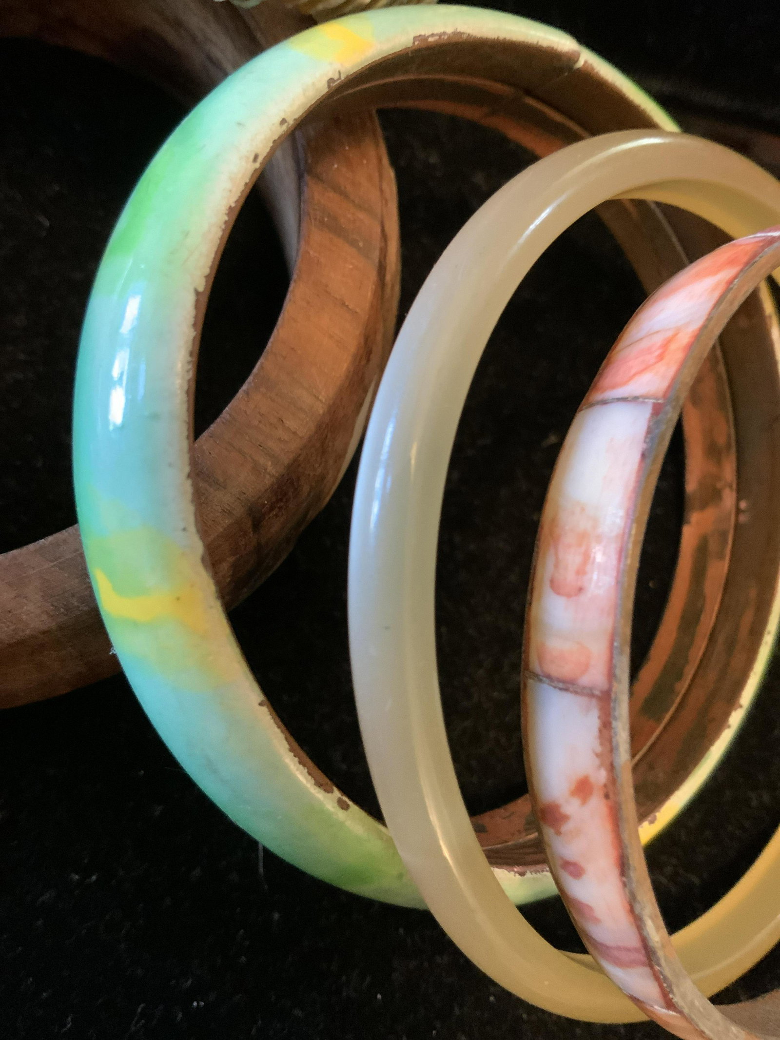 group Lot 7 Vintage Bangle Bracelets: Vintage jewelry, estate jewelry, fashion accessories, lot of seven bracelets including wood, brass, enamel copper, shell, possibly Bakelite, costume jewelry