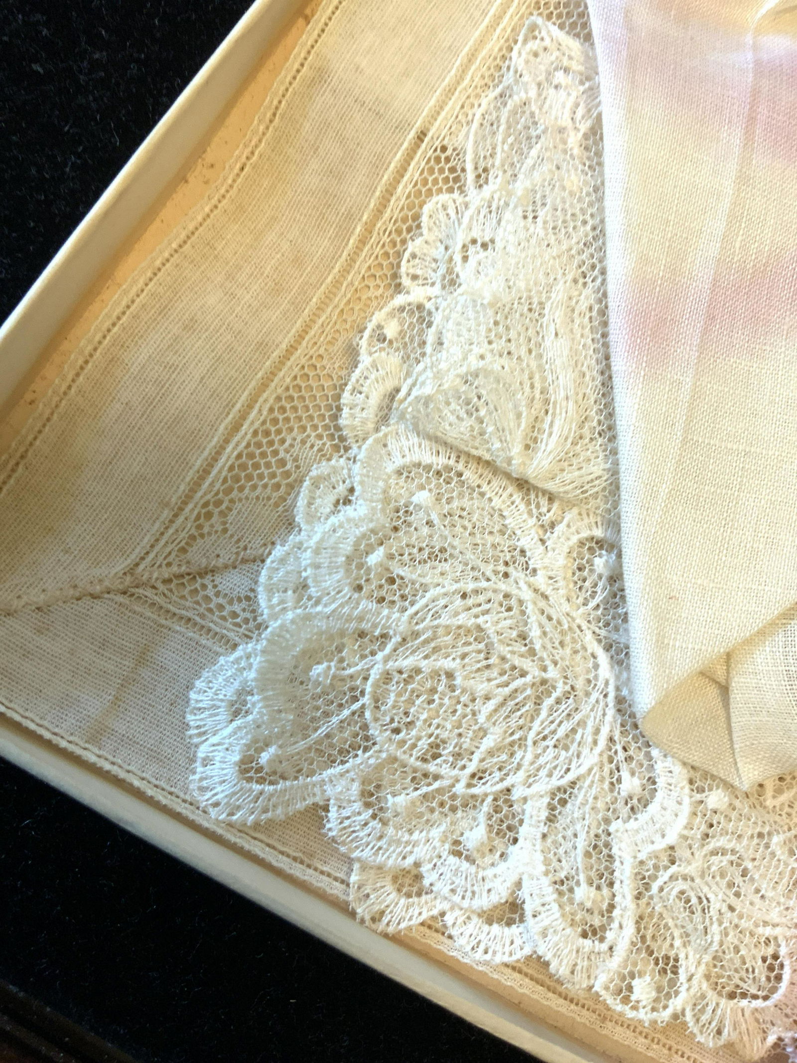 Boxed Set Vintage Linens: Red bowed wrapped group of vintage Linens, handkerchiefs, lace borders, color ran from red ribbon, in box, measures app 9 inches square