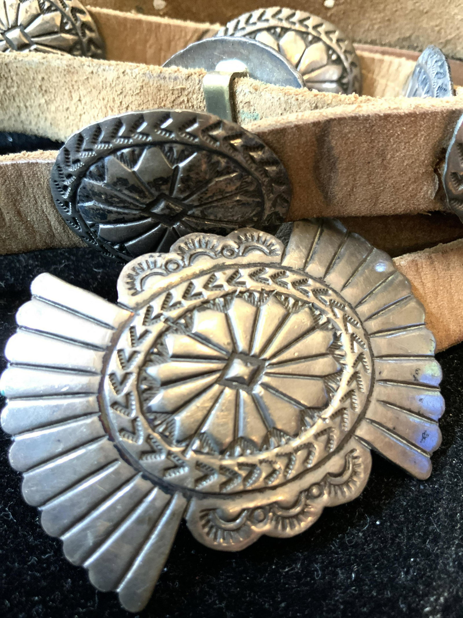 Sterling Silver Leather Belt, Mexico: Marked Sterling and 925, belt, buckle and 4 ft full length, total weight 5.63 Troy ounces, buckle and multiple silver etched disc accents, sterling silver fashion accessory