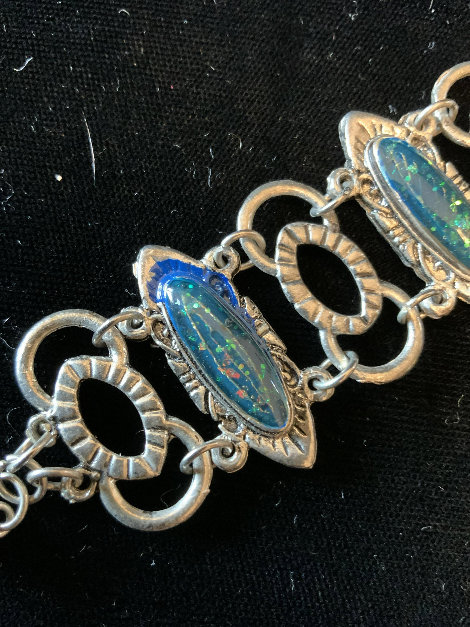 Vintage Silver and Opal Toned Link Bracelet: Multi ringed silver toned chain with centerpiece opal like design, bracelet measures length 7.5 inches width 1.25 inches, costume jewelry, fashion jewelry, estate jewelry, fashion accessory, wearable 