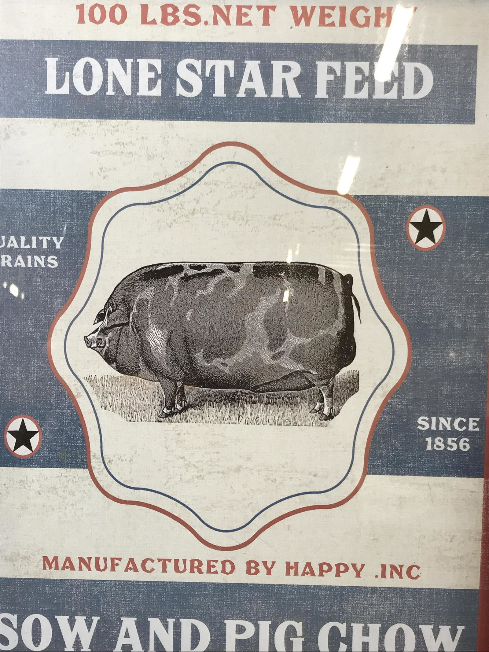 Framed Sow & Pig Chow Advertisement New in Box: Framed Advertisement new in box, ad displays text and a black and white pig on a white and blue striped background stars and red border, text on top center section reads ‘100 Lbs Net Weight Lone Sta