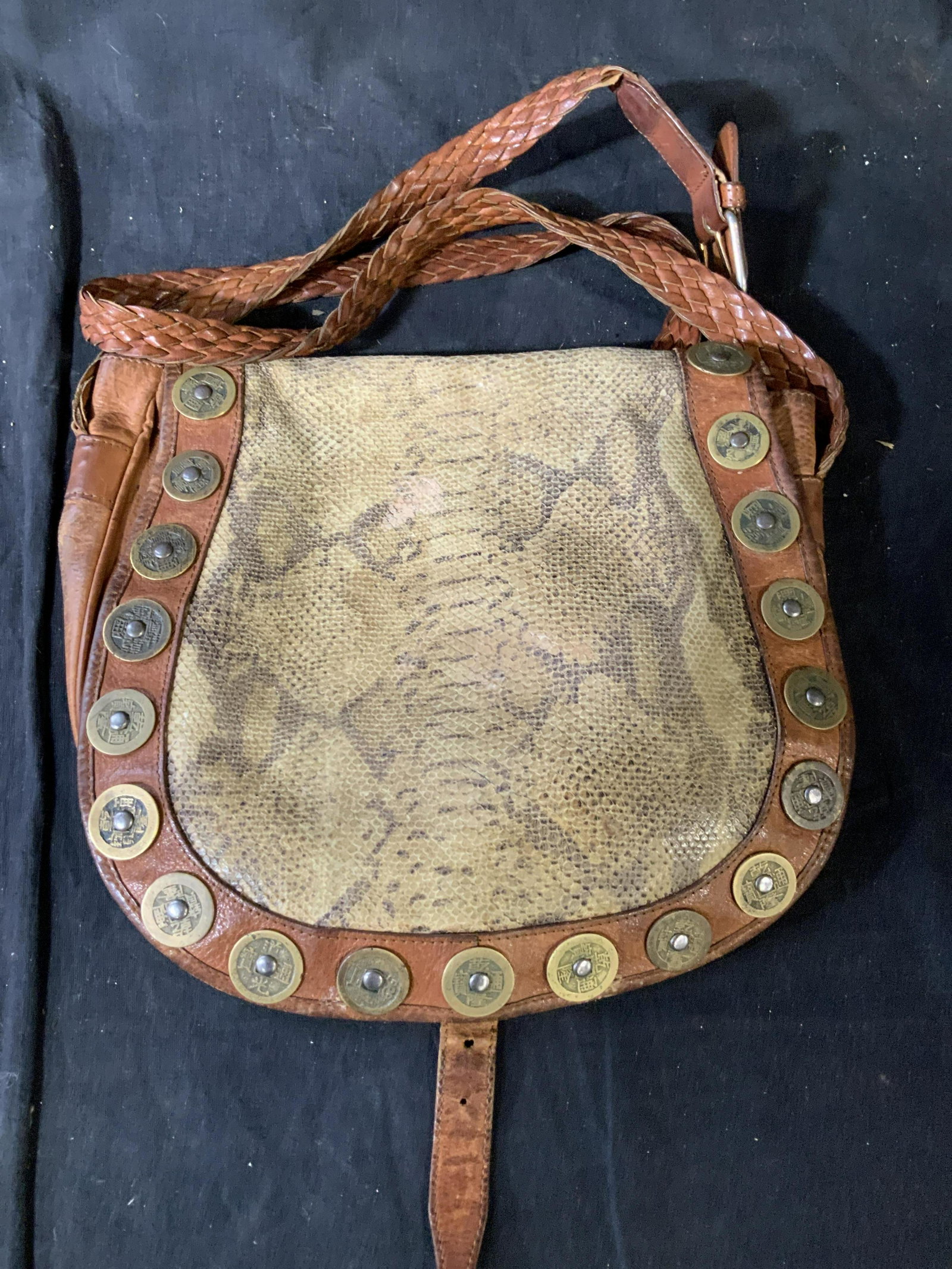 Vintage Italian Snake Skin Pocket Book: Labeled for Cul de Sac, genuine snake skin shoulder bag with leather trim and brass accents, braided , brass accents, shoulder bag, pocket back, carry all, tote, sac measures 11 inches, by 12 inches, 