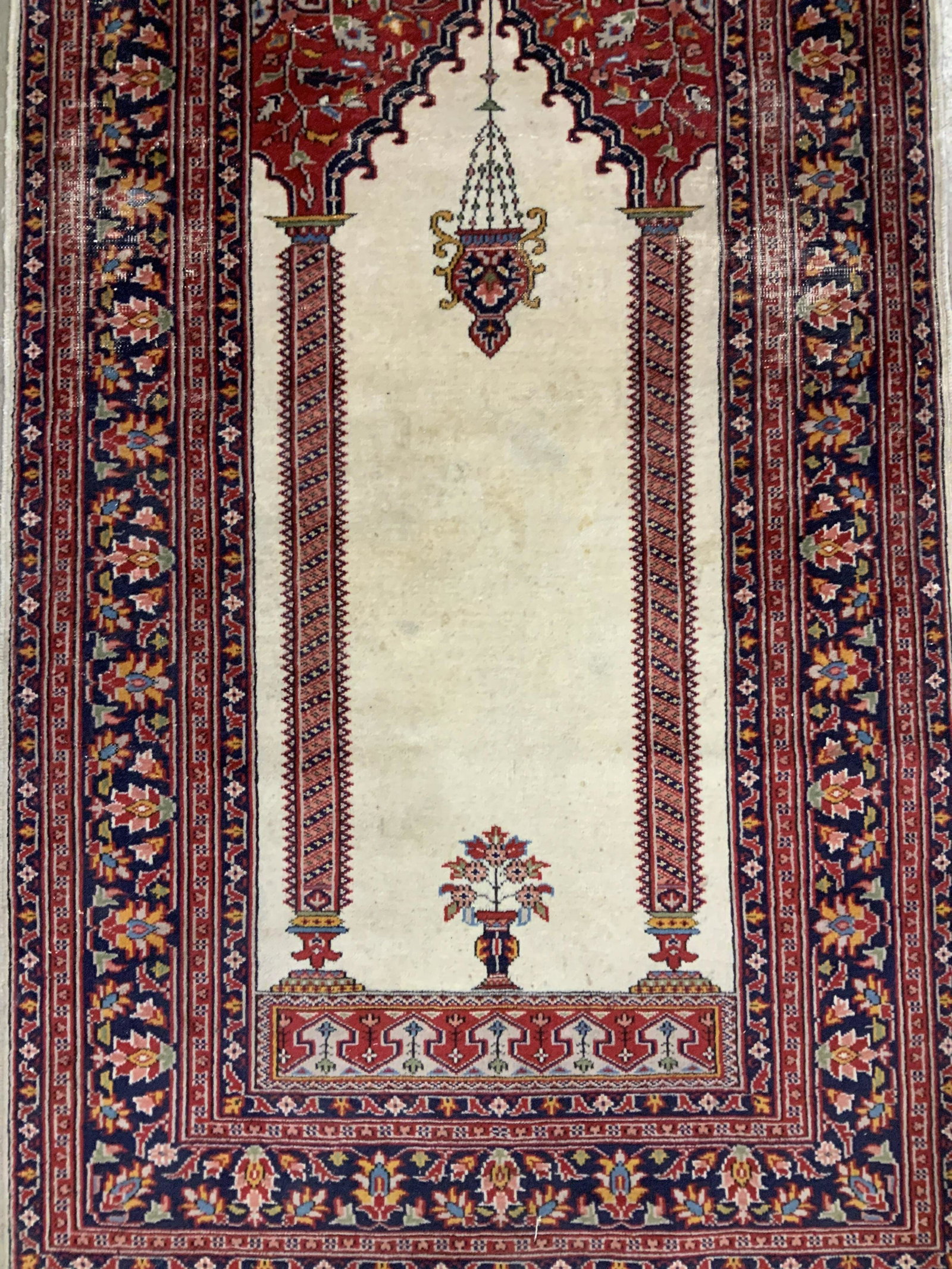 Red Creal Wool Oriental Carpet: Hand made oriental carpet, rug, home furnishings, tones maroon red cream, property of New York City Estate, area rug, throw rug, measures 64 by 37 inches, has wear needs cleaning