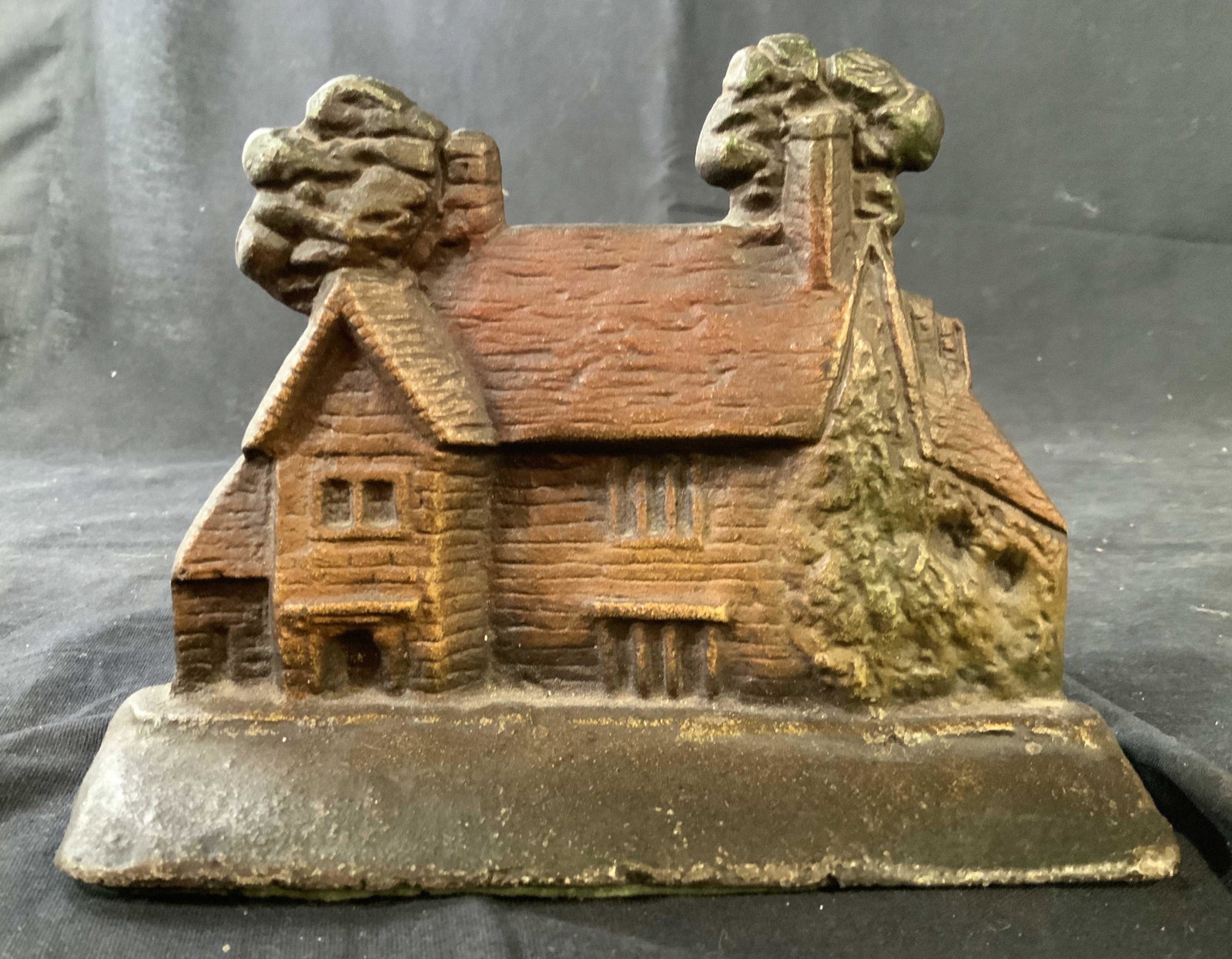 Antique English Cottage Cast Iron Door Stop: Antique collectible door stop, iron, collectible, country decor, decorative object, number on back reads 37, measures ht 6 inches width 7 inches