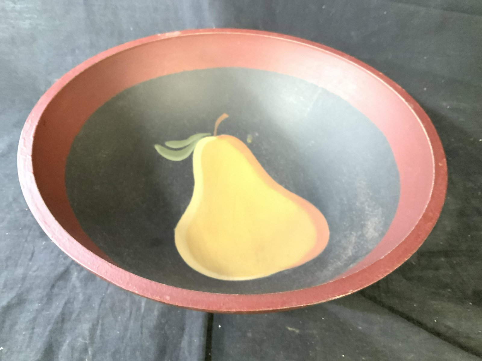 Painted Wood Serving Bowl: Pear at center of maroon and black wood bowl, country decor, decorative accessory, table ware measures 5 inches ht diameter app 14 inches