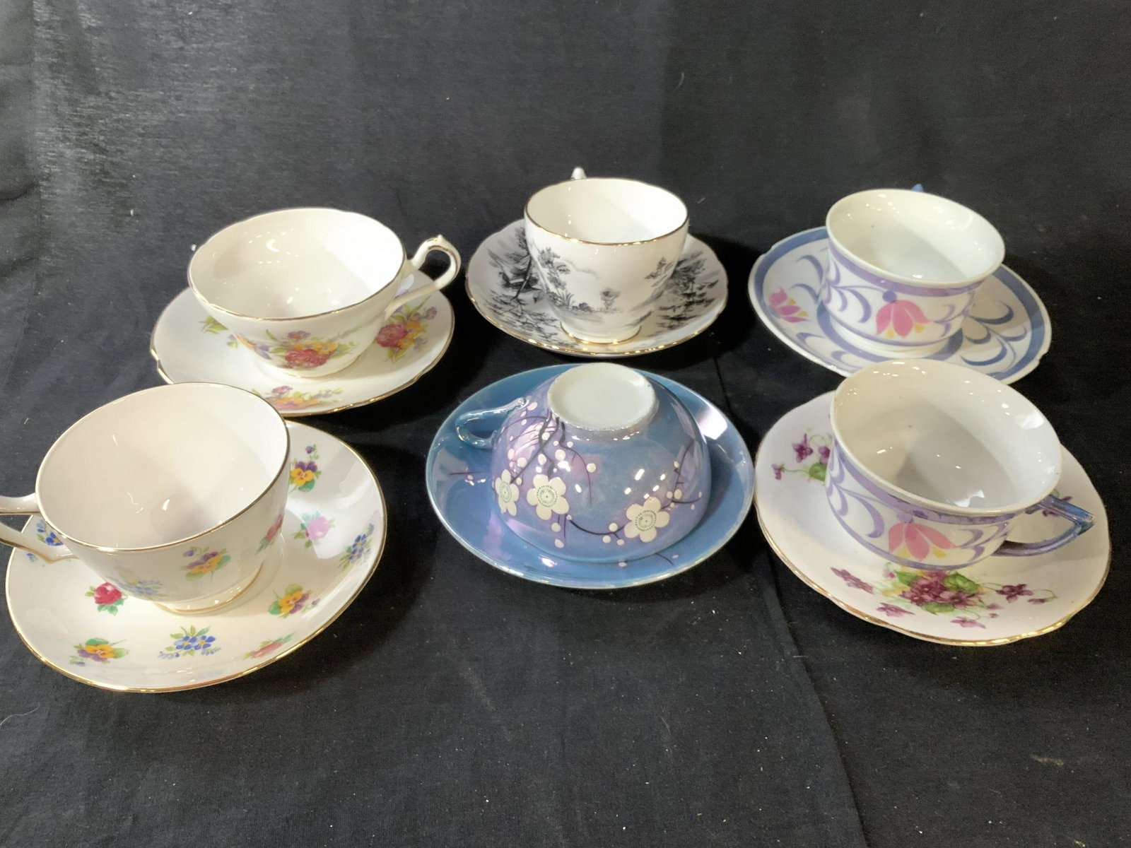 Group porcelain Tea Cups Saucers and extras: English tea cups saucers, different markings brass include Staffordshire, made in England, Grosvenor China toile, , Germany Lichtenburg, Clarence, , 12 pieces