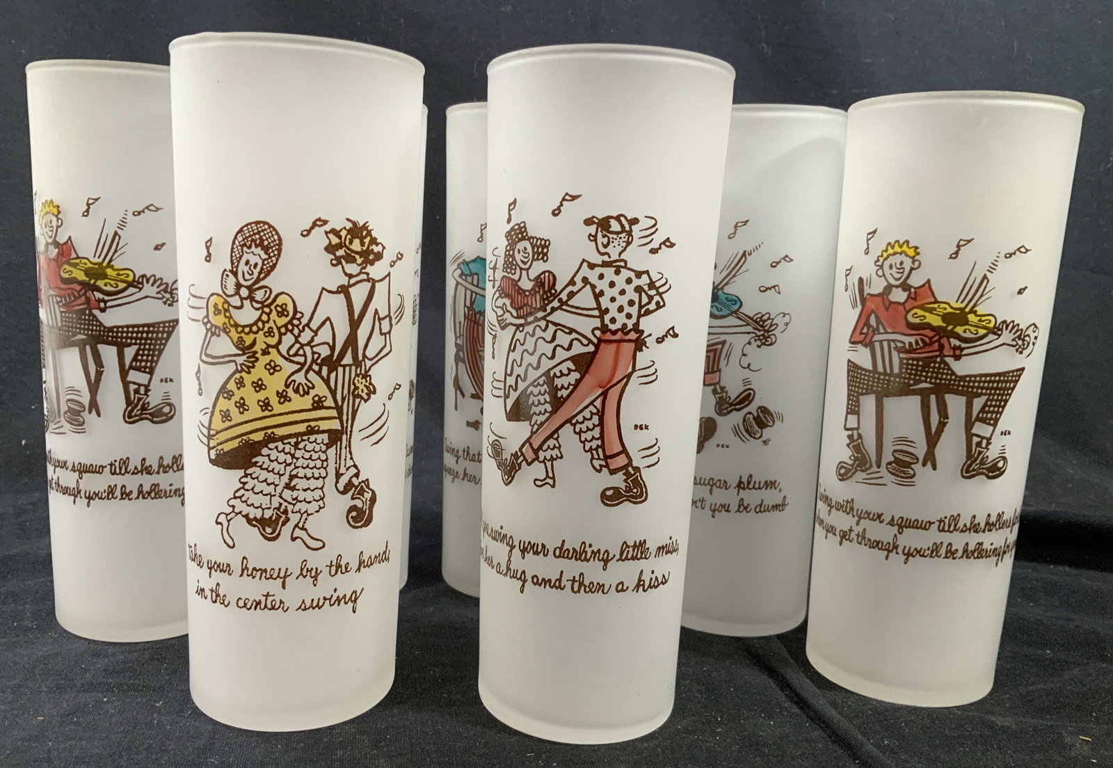 Vintage Frosted Swing Dance Bar Ware Set: Drinking glasses, high ball glasses, vintage glasses set of 7, each with figural and swing dance saying, vintage bar ware, cocktail glasses, each measures ht 7 inches diameter app 2.5 inches, collecti
