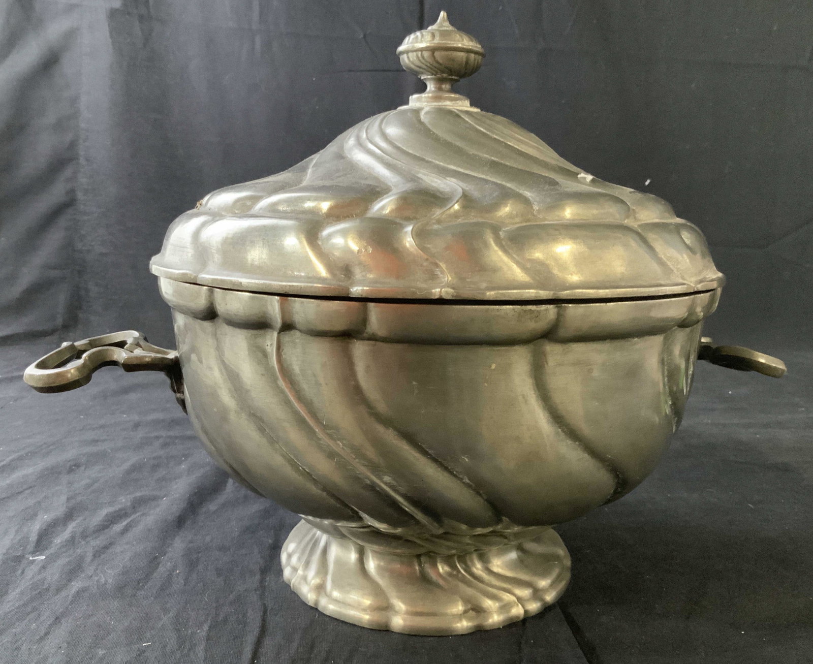 Lidded Metal Pedestal Bowl: Possibly pewter, pewter toned metal tureen, bowl, pedestal bowl, serve ware, table ware, decorative object, measures htb11 inches diameter app 15 inches to handles