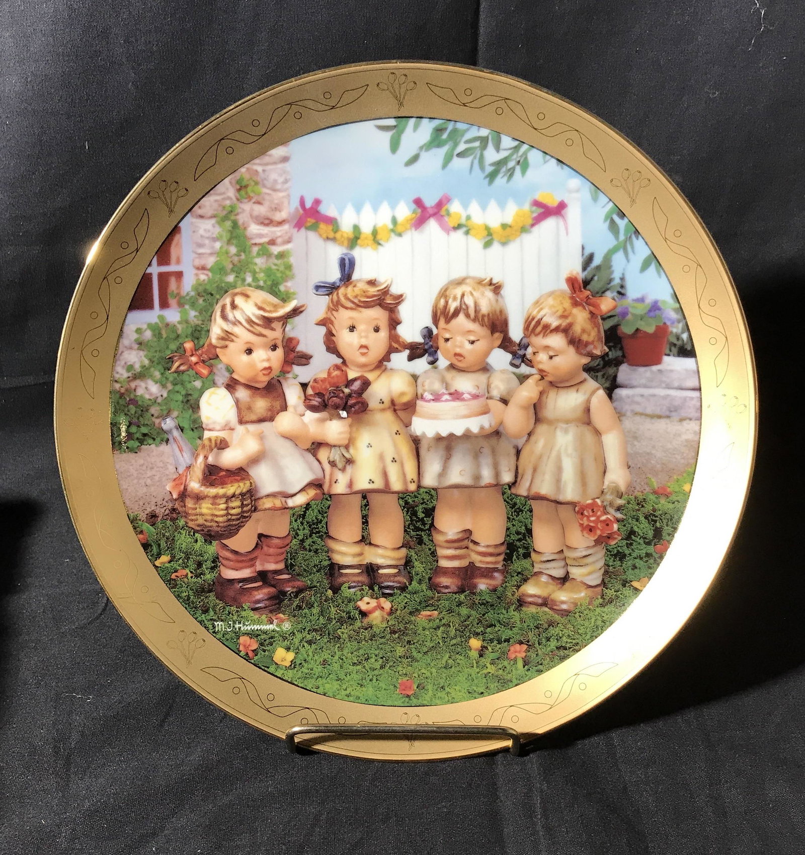 Limited Edition M.J. Hummel Century Plate: Limited edition MJ Hummel Century Plate, made of porcelain with gold finish, marked lower left section ‘M.J. Hummel’, reverse reads ‘The MJ Hummel Century Plate ‘We Wish You The Best’ A limi