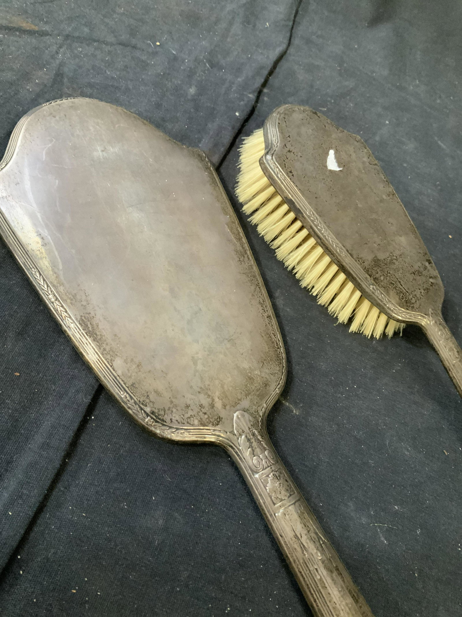 Antique Silver Brush Mirror Dresser Set: Silver toned possibly sterling possibly plate, no markings found, antique Dresser set includes hand held mirror length 15 inches width 5 inches, also has silver toned brush, collectible vanity accesso