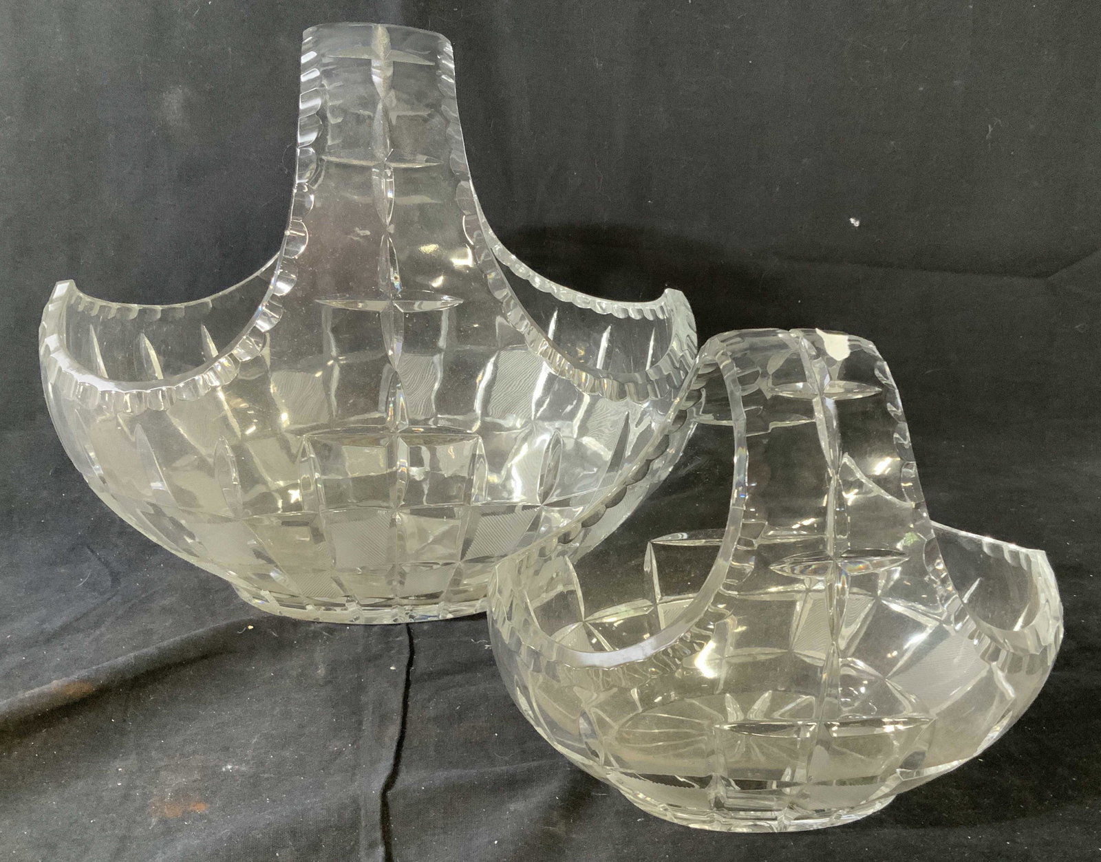 Lot Two Crystal Baskets Tableware: Vintage glass crystal table ware two checker board baskets, vases, fruit bowls, table top accessories, tallest measures ht 11 inches length 12 inches, width 8 inches