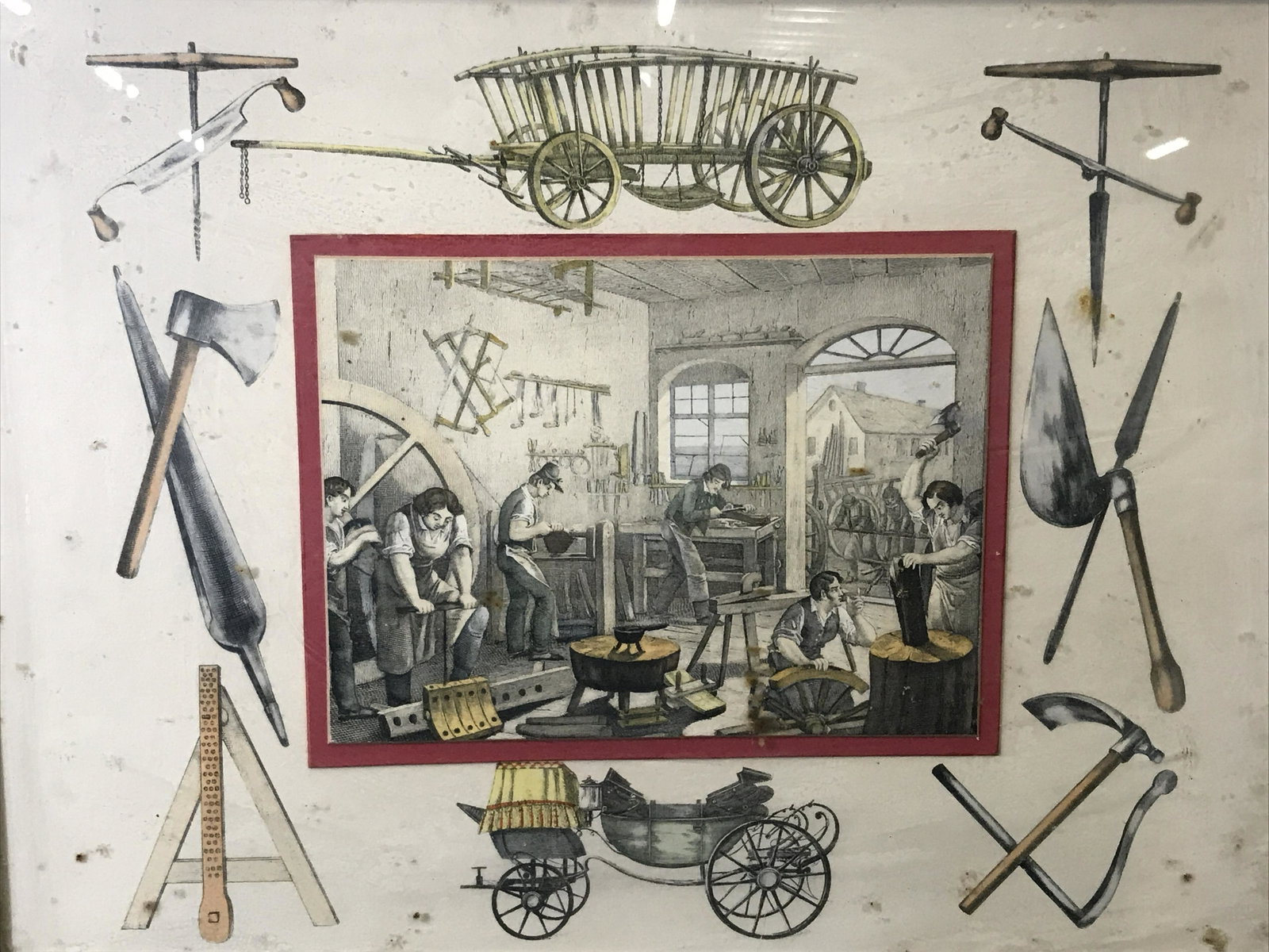 Hand Colored Art Gravure Print: Hand colored art gravure print, no apparent signature, subject an engraving of an artisanal workshop possibly a wood working shop with workers busy doing various jobs, red matting, background of frame