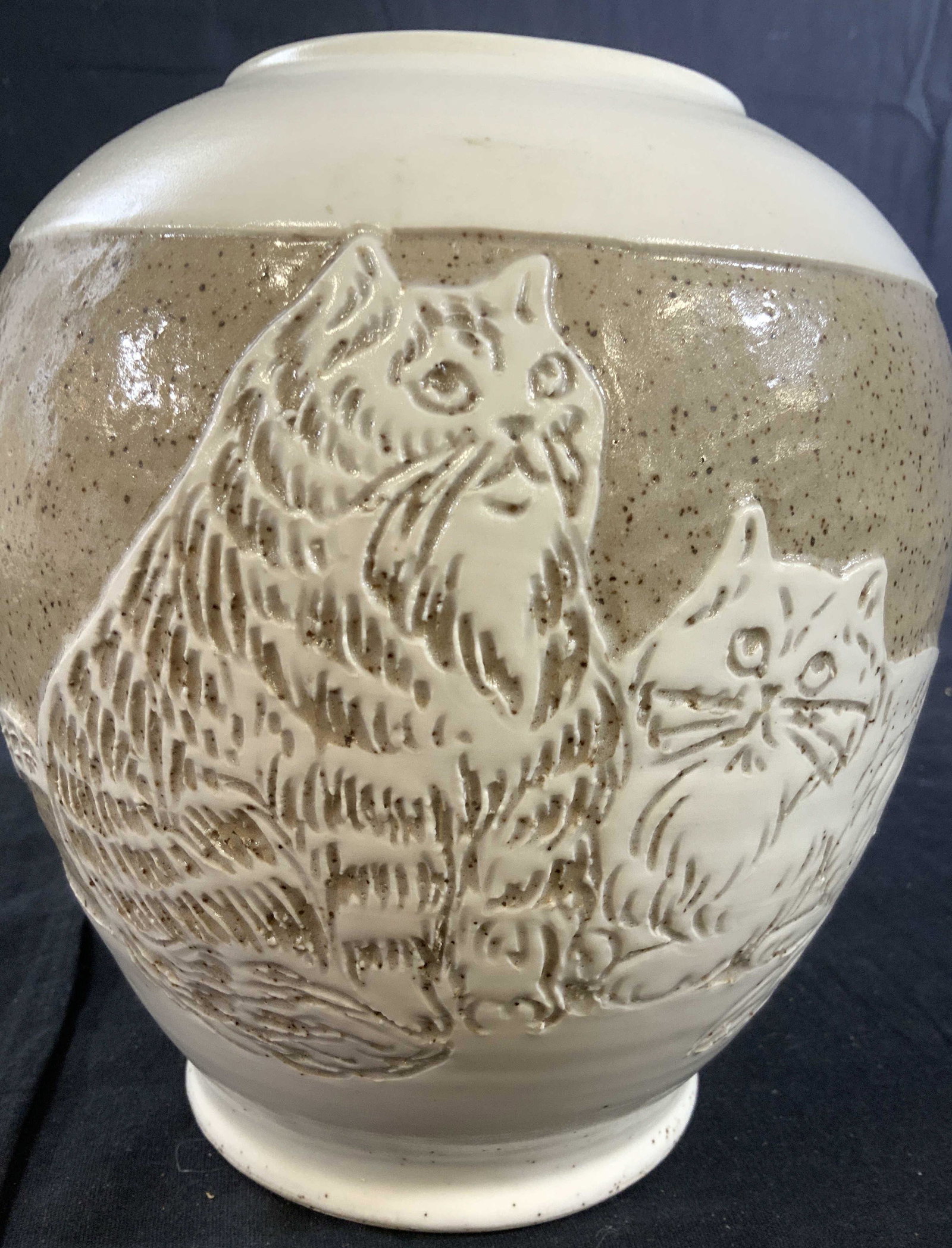 Signed Heavy Weight Cat Design Ceramic Vase: Ceramic vase, pottery, white and cream toned, center design has cats and kittens at play, inscribed underside is Turn and Burn Pottery , Sea Grove, NC Isiah, 9.6, North Carolina, USA, other writing an