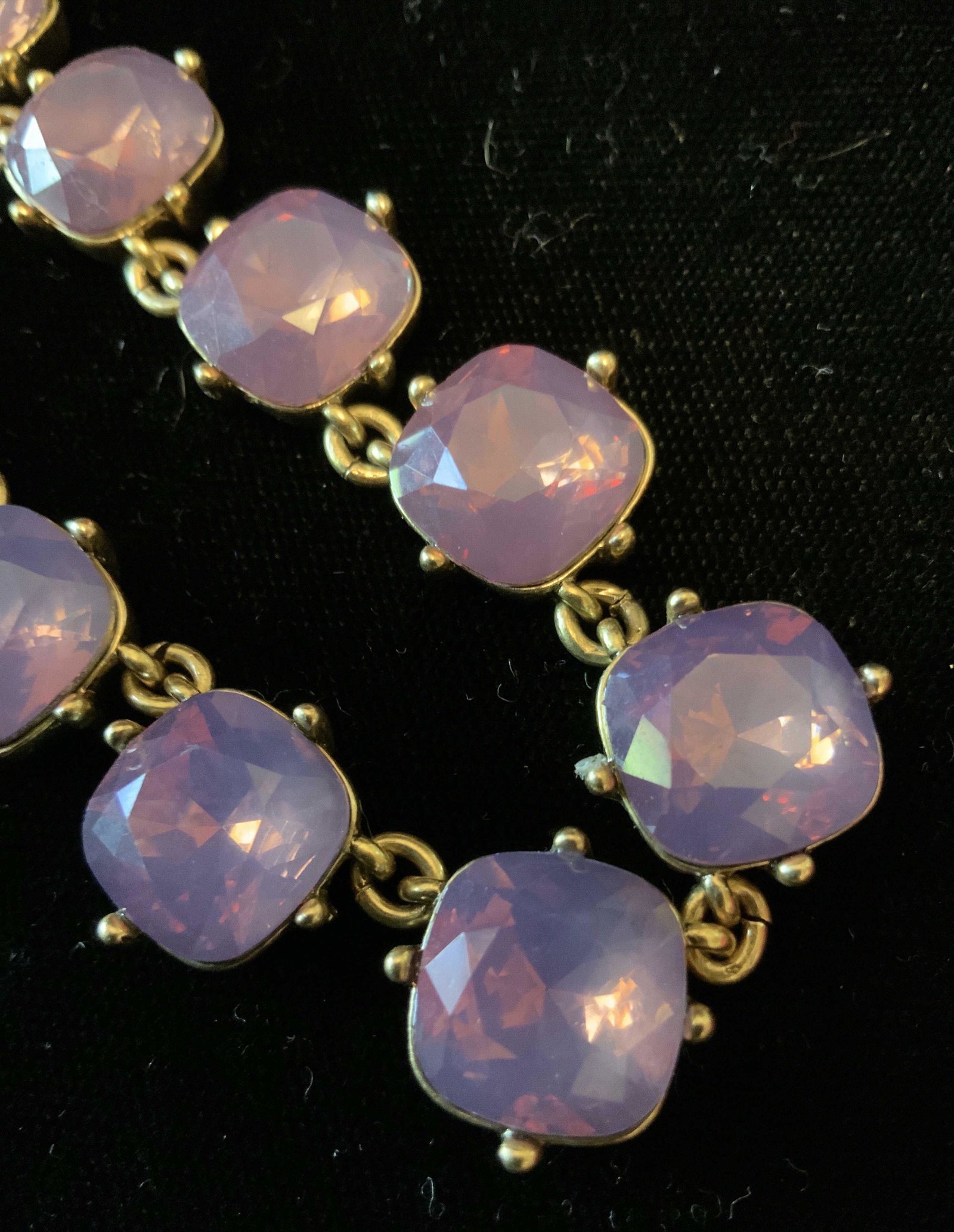 J Crew Purple Toned Fashion Jewelry Necklace: Purple pink toned faceted beads set in gold toned metal setting and chain, iridescence to each purple pink bead, adjustable length, estate jewelry, fashion necklace, fashion accessory