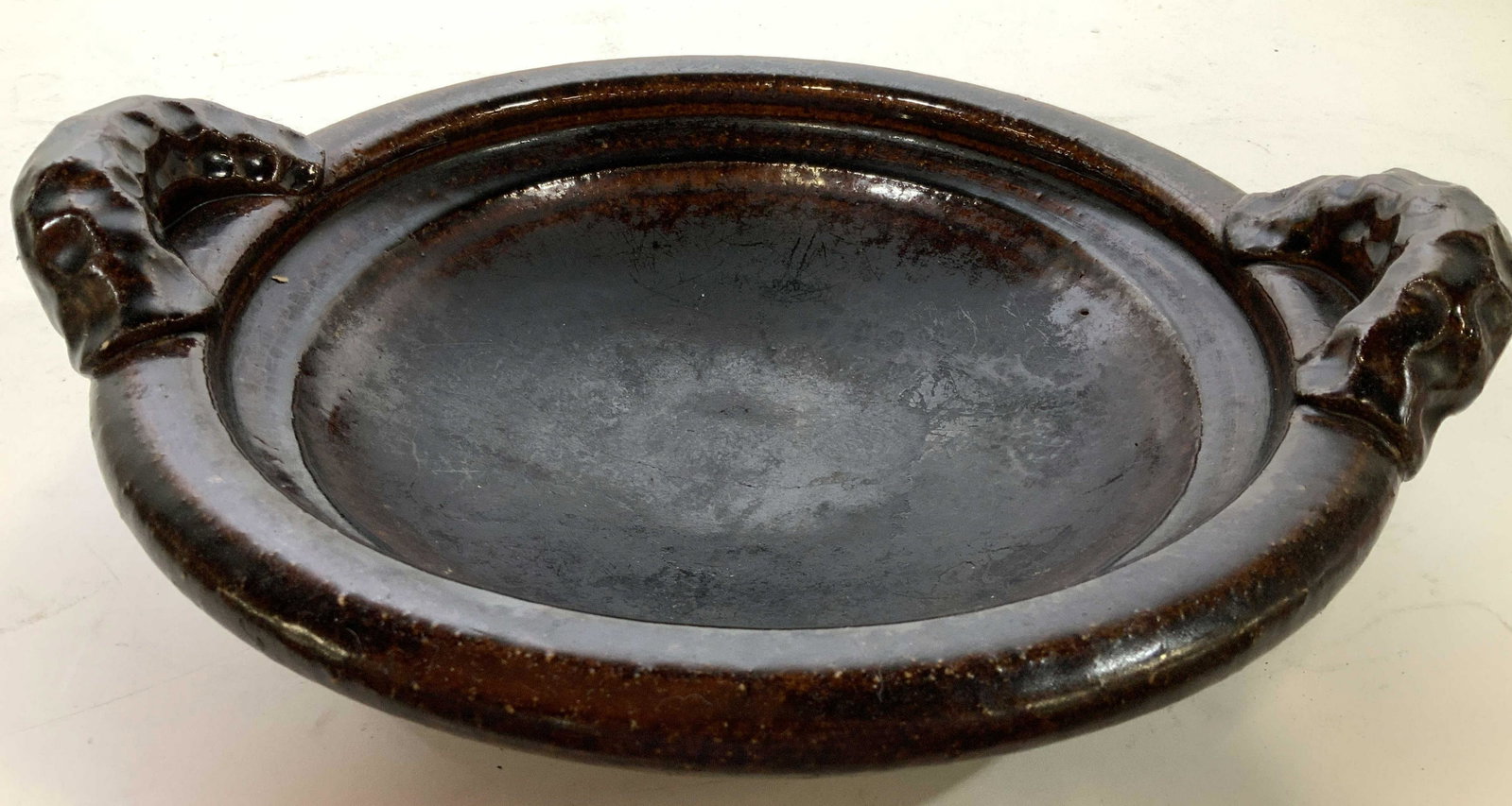 Hand Crafted Glazed Center Pottery Bowl: Rich Browns glazed Pottery Bowl, vessel, platter, centerpiece, shaped double handles, table ware, artist made pottery , hand crafted, decorative object, measures app ht app 4.5 inches diameter 15 inch