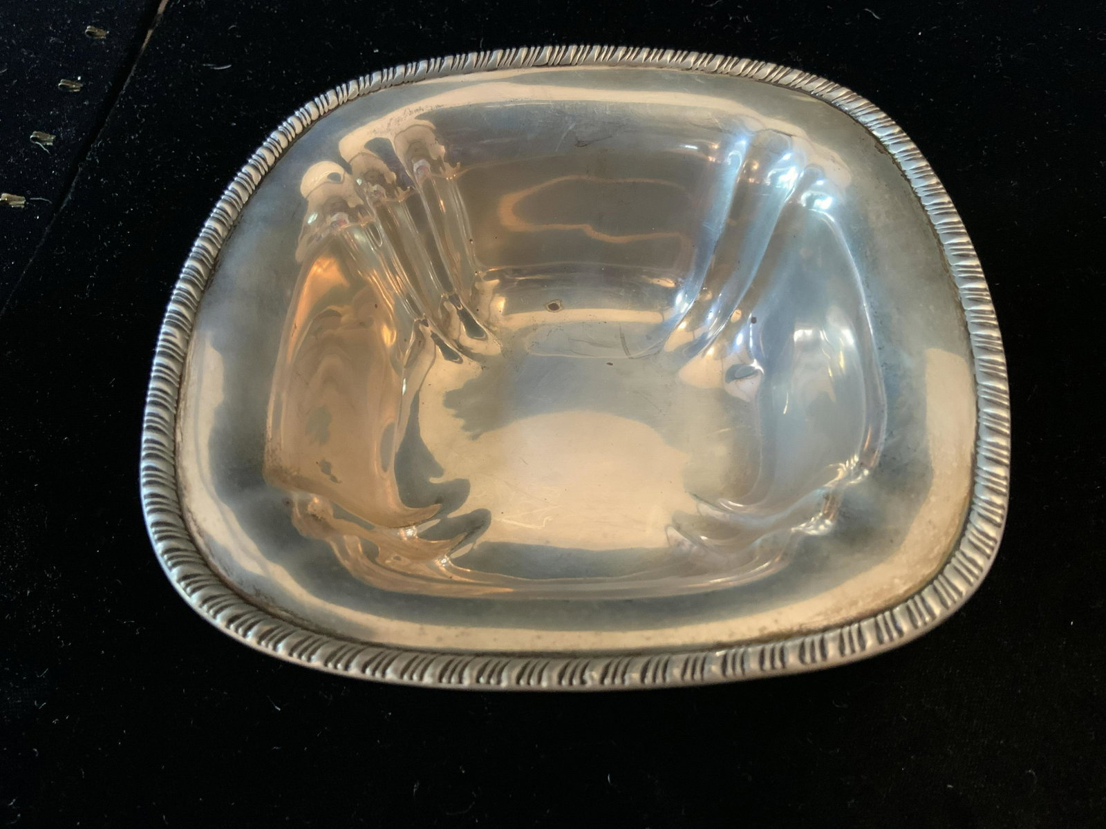 Antique Sterling Silver Bowl w Brim: Antique Sterling Silver Bowl , marked underside with W in circle, Sterling, and number B 830, bowl, hollow ware, nut dish candy dish, tableware, fluted sides and wide brim with scrolled edging, measur