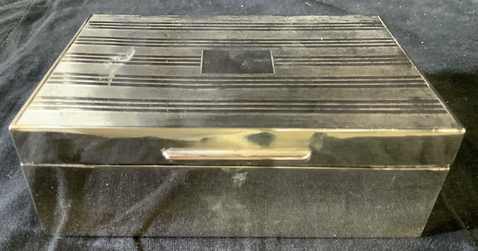 Mappin and Webb Silver Keepsake Box: Engraved on underside for Mappun and Webb, other trademarks and numbers illegible, silver tone, possibly silver, over wood box, measures ht 2 inches top 5.5 by 3.75 inches, desk top accessory, mappin 