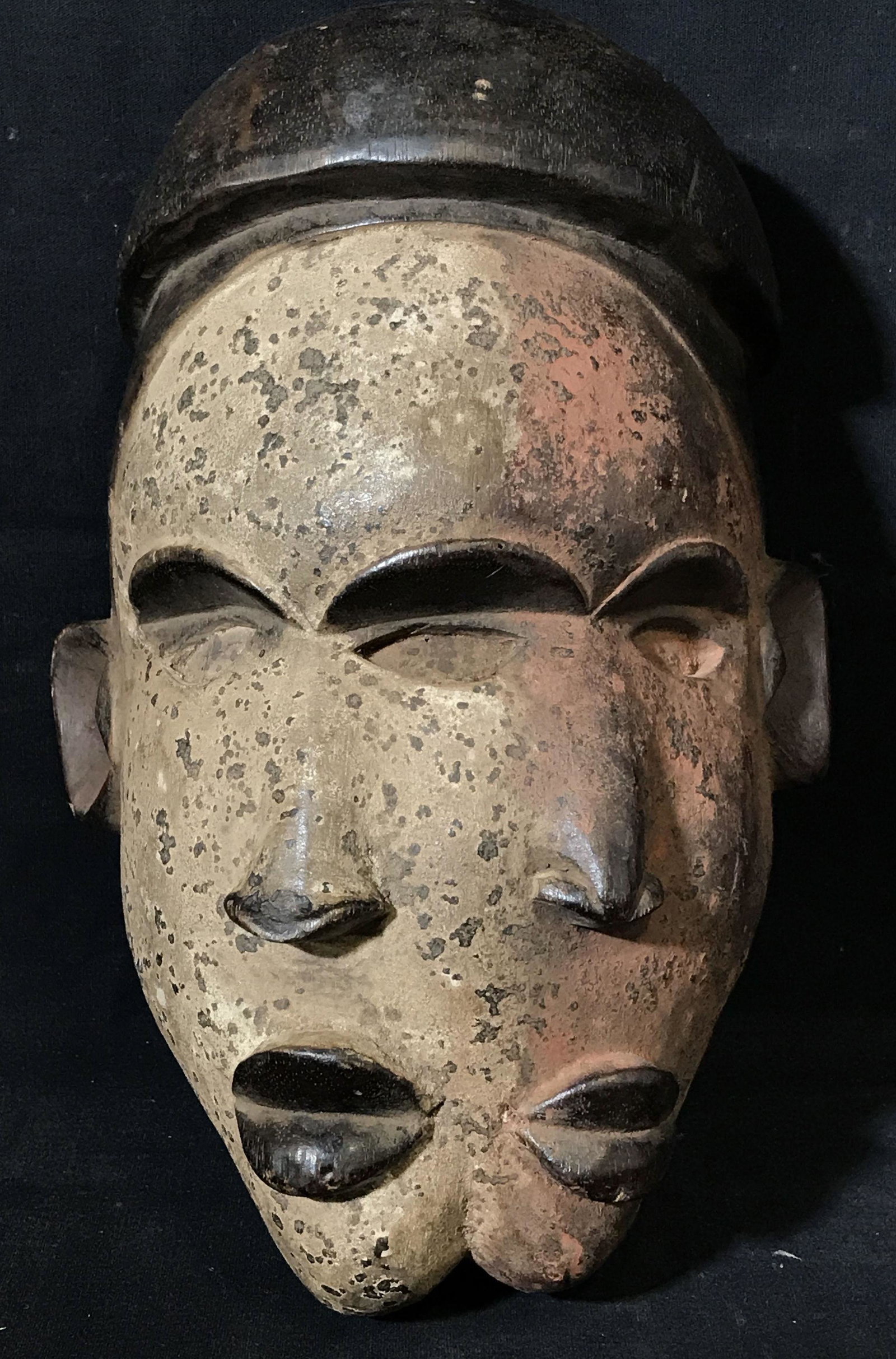 Bakongo Red & White Face Mask: Bakongo red and white Face Mask, origins of the the Bakongo people can be found in what was previously known as the Republic of Zaire a section of land that is now apart of the Democratic Republic of 
