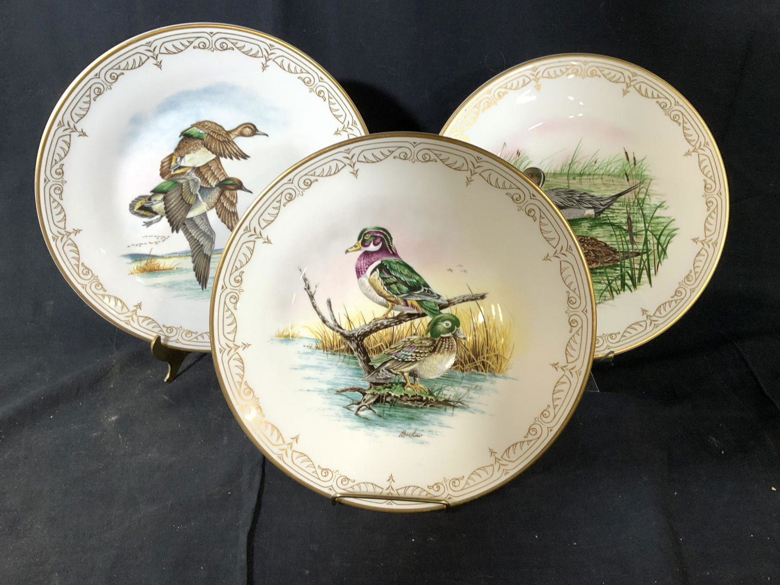 Set 8 Boehm Waterbird Plates England: Underside reads the Edward Marshall Boehm Waterbird Plate Collection, Wood Ducks, Horse and feather trademark, collection of eight bone China plates depicting water birds of North America, designed by