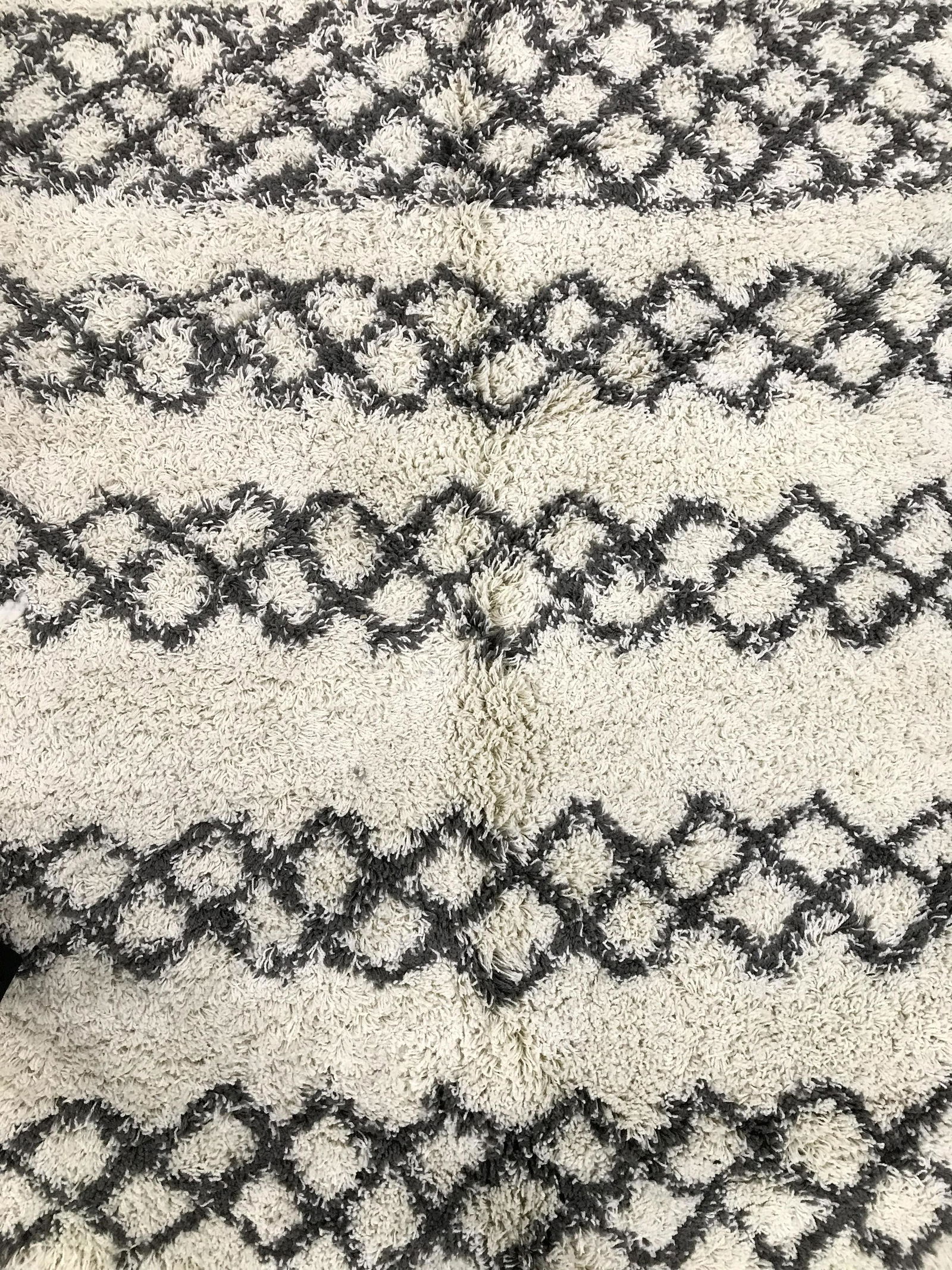 MOMENI Machine Made Turkish Rug: Underside of rug has tags which reads MAYA COLLECTION BY MOMENI MADE IN TURKEY. Rug measurements as reads on tag is 7 ft 10 inches by 9 feet 10 inches. Rug has MAY 3 IVY Design as reads on tag. Rug, m