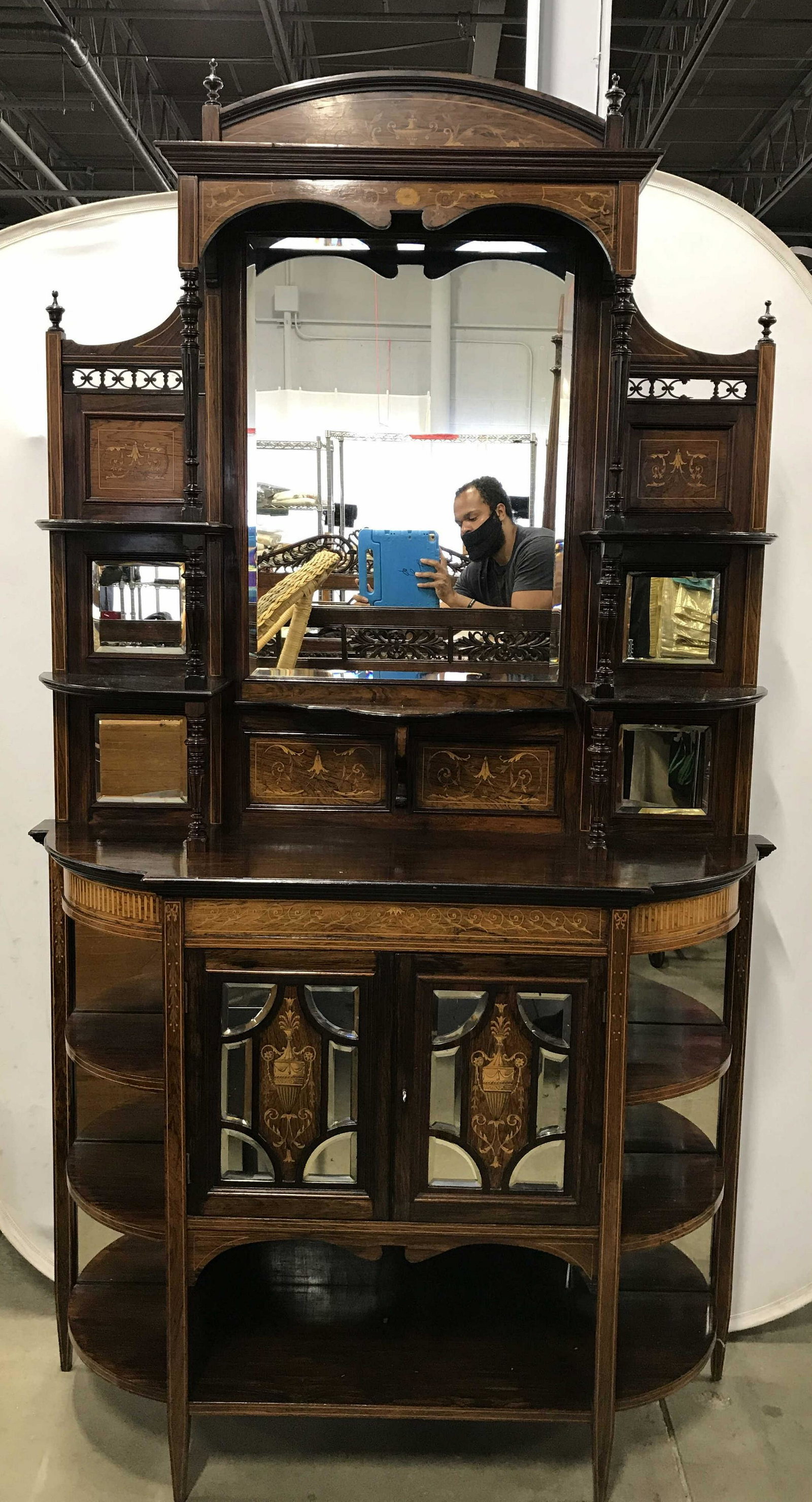 Antique Victorian Mirror Display Cabinet, late 19th c: Display cabinet has Victorian style. Piece has inlaid detail. Top half of piece has 1 large & 4 small beveled mirrored surfaces. Top half also has 5 shelved areas 4 finial structures. Lower half conta