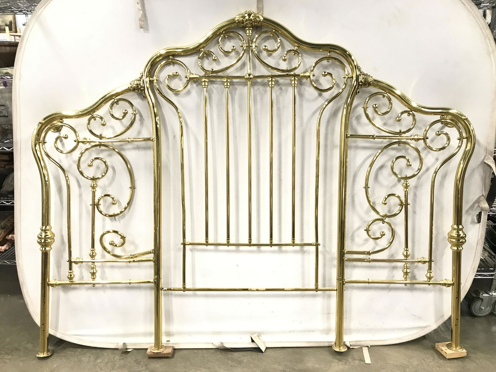 Vintage Gold Toned Brass Headboard: Headboard is gold toned and brass. Piece has c curve detail in multiple areas. Measures approximately 78 inches long 63 inches tall. Headboard Is vintage possibly antique. Headboard, bedroom furniture